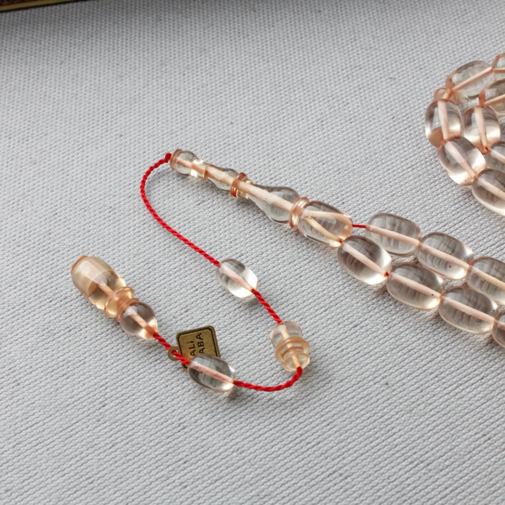 Ali Baba Usta İmzalı Şeffaf Renk Kapsül Kesim Ateş Kehribar Tespih