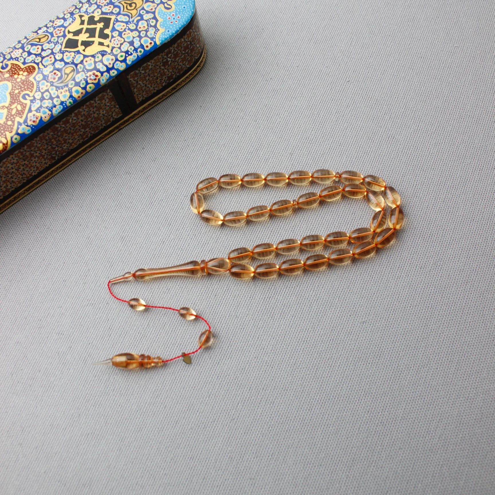 Serkan Başkan Usta İmzalı Şeffaf Renk Badem Model Ateş Kehribar Tespih