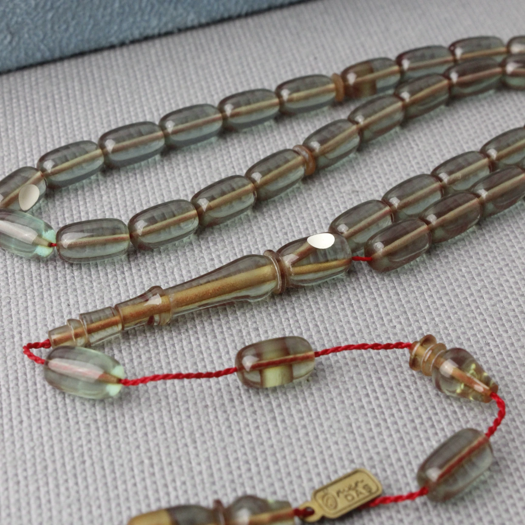 Özel Kutusunda Ömer Daş Usta İmzalı Zar Objeden Patinli Kehribar Tespih