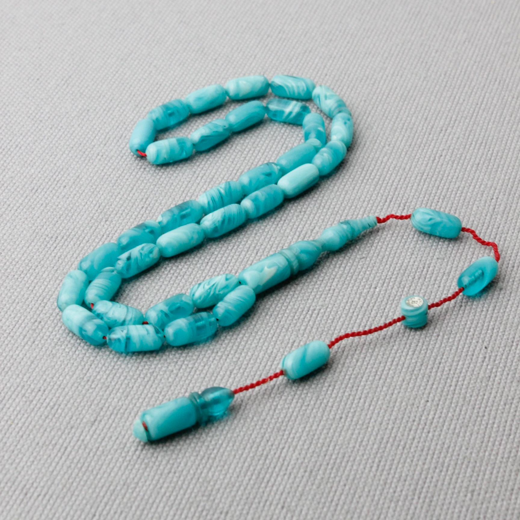 Halil Demirkol Usta İmzalı Yoğun Hareli Deniz Mavisi Sıkma Kehribar Tespih