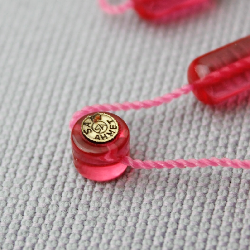 Sarı Ahmet Usta İmzalı Neon Pembe Sıkma Kehribar Tespih