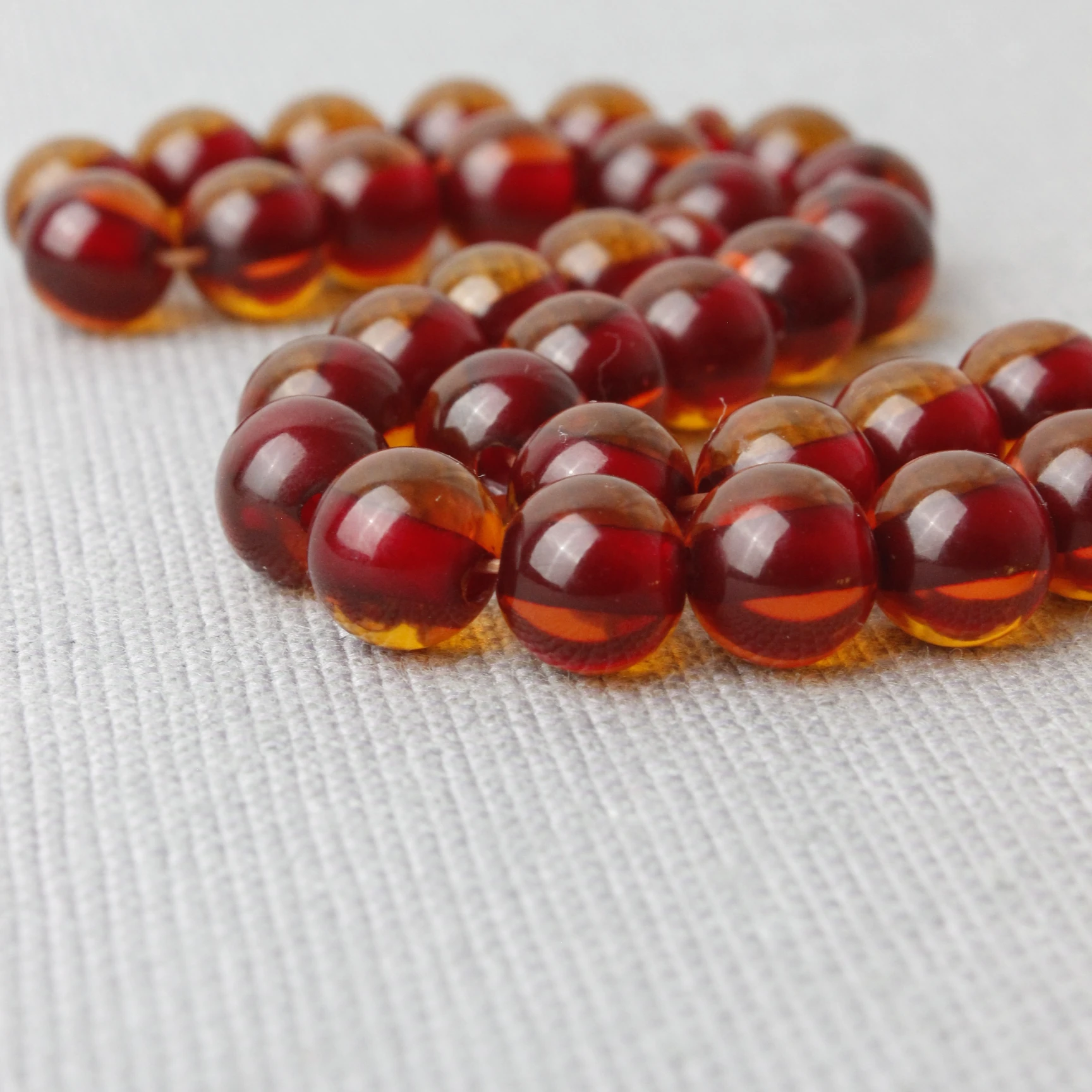 Küre Kesim Çelik Püsküllü Ateş Kehribar Tespih 