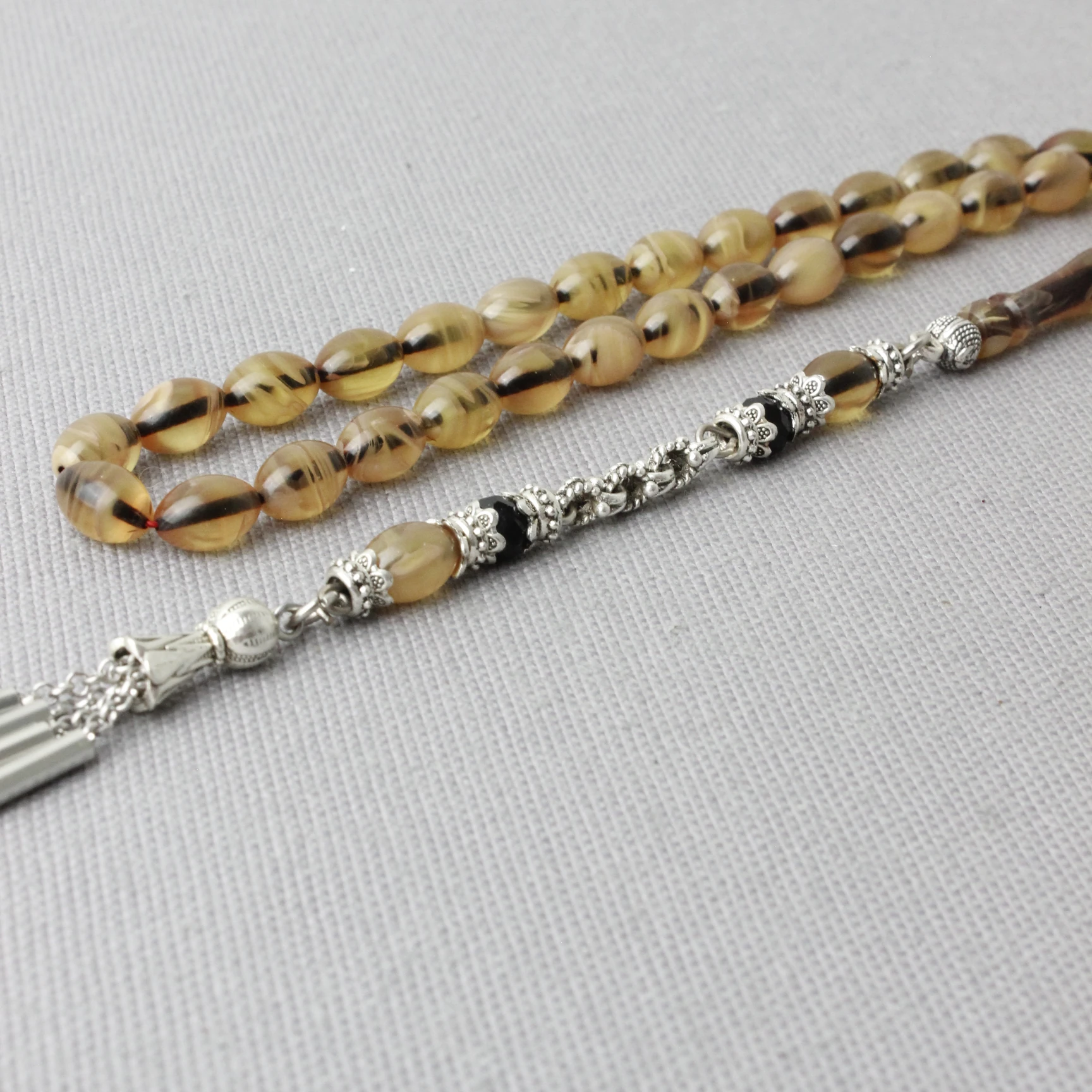  Hareli Beyzi Model Sıkma Kehribar Tespih 