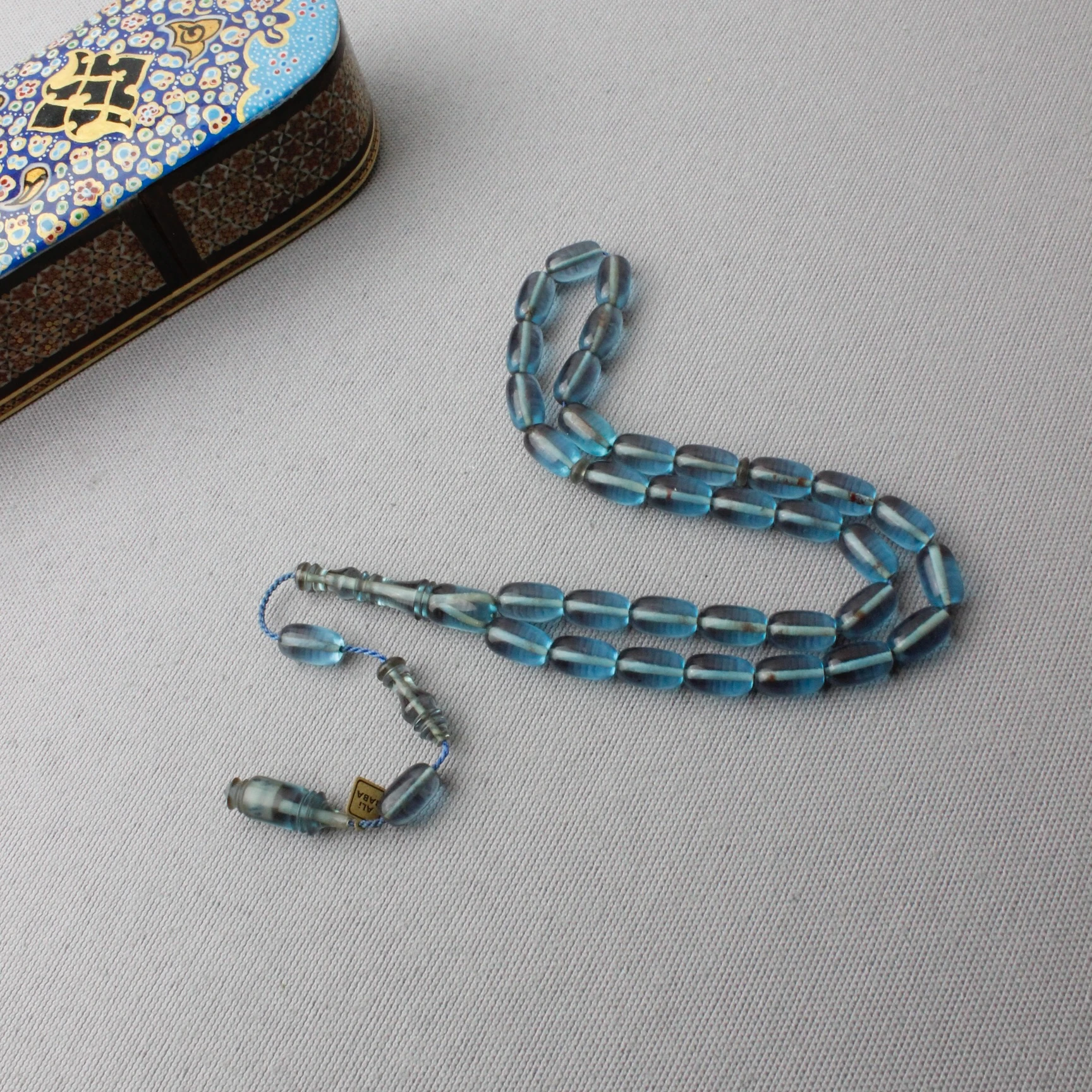 Ali Baba Usta İmzalı Kapsül Kesim Turkuaz Renk Sıkma Kehribar Tespih