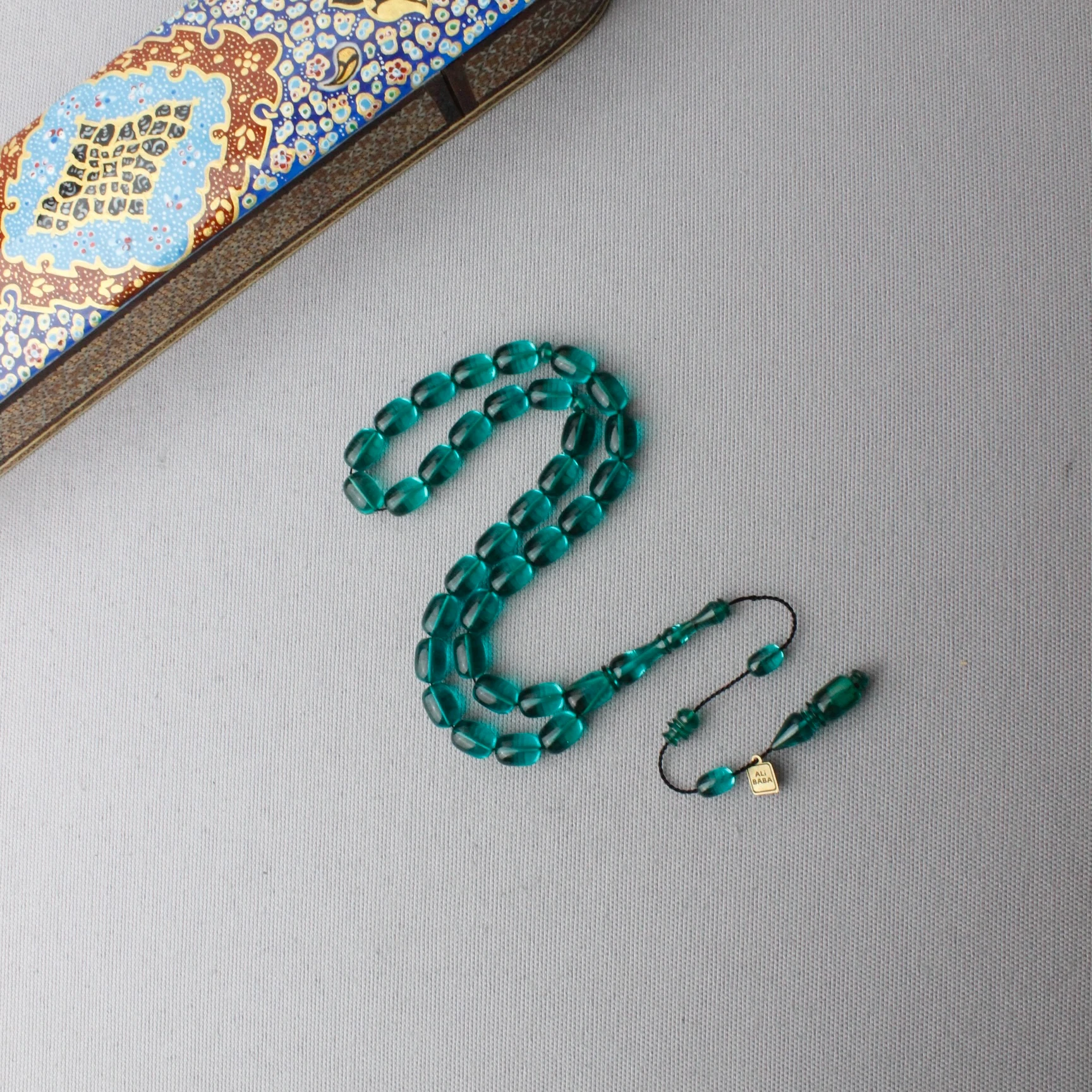 Ali Baba Usta İmzalı Gökyüzü Mavisi Kapsül Kesim Ateş Kehribar Tespih