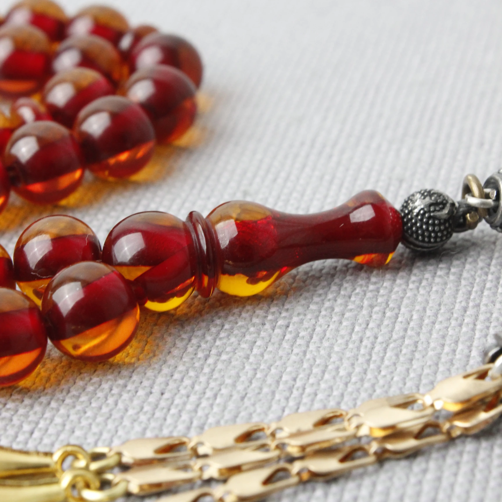 Küre Kesim Çelik Püsküllü Ateş Kehribar Tespih 