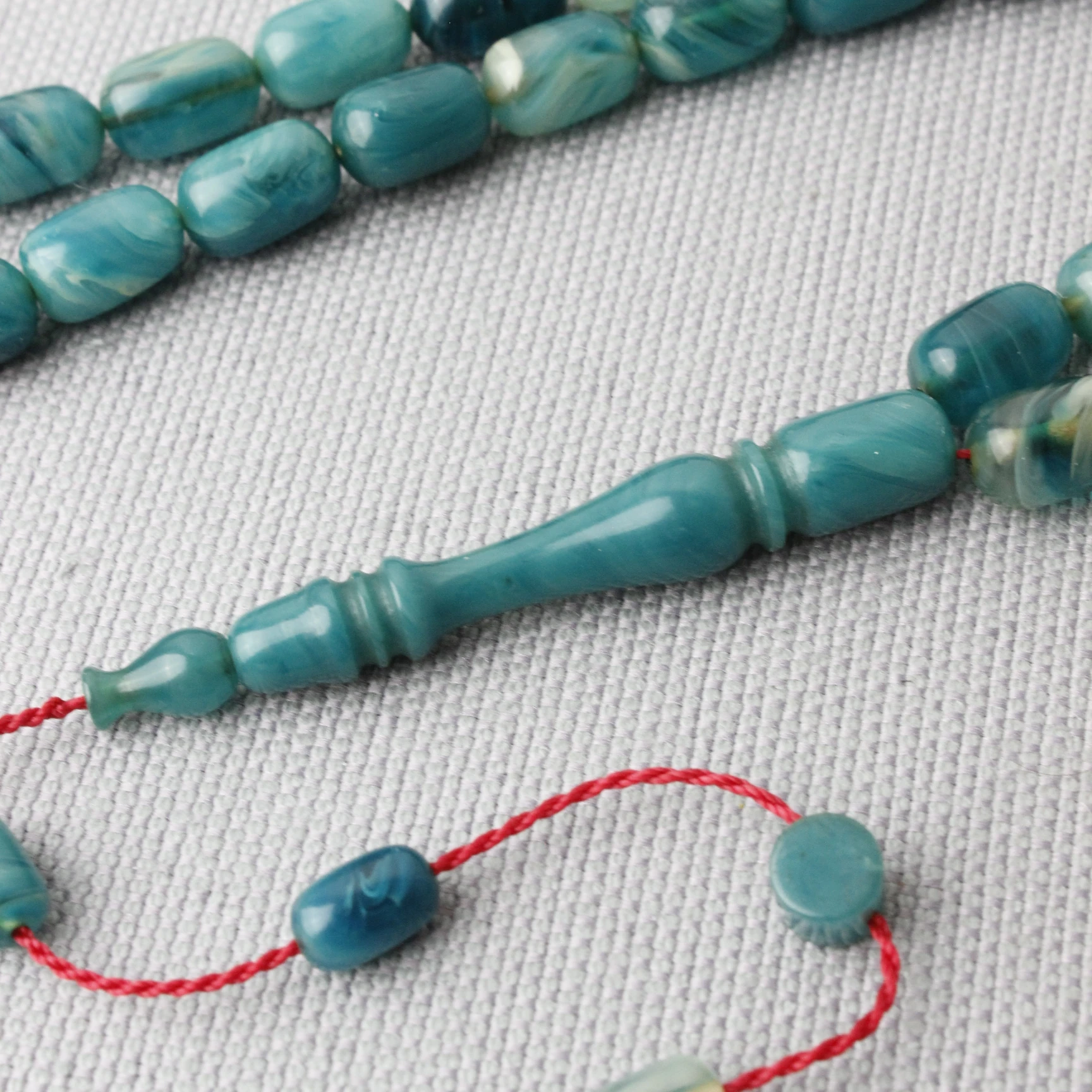 Deniz Mavisi Hareli Kapsül Kesim Sıkma Kehribar Tespih