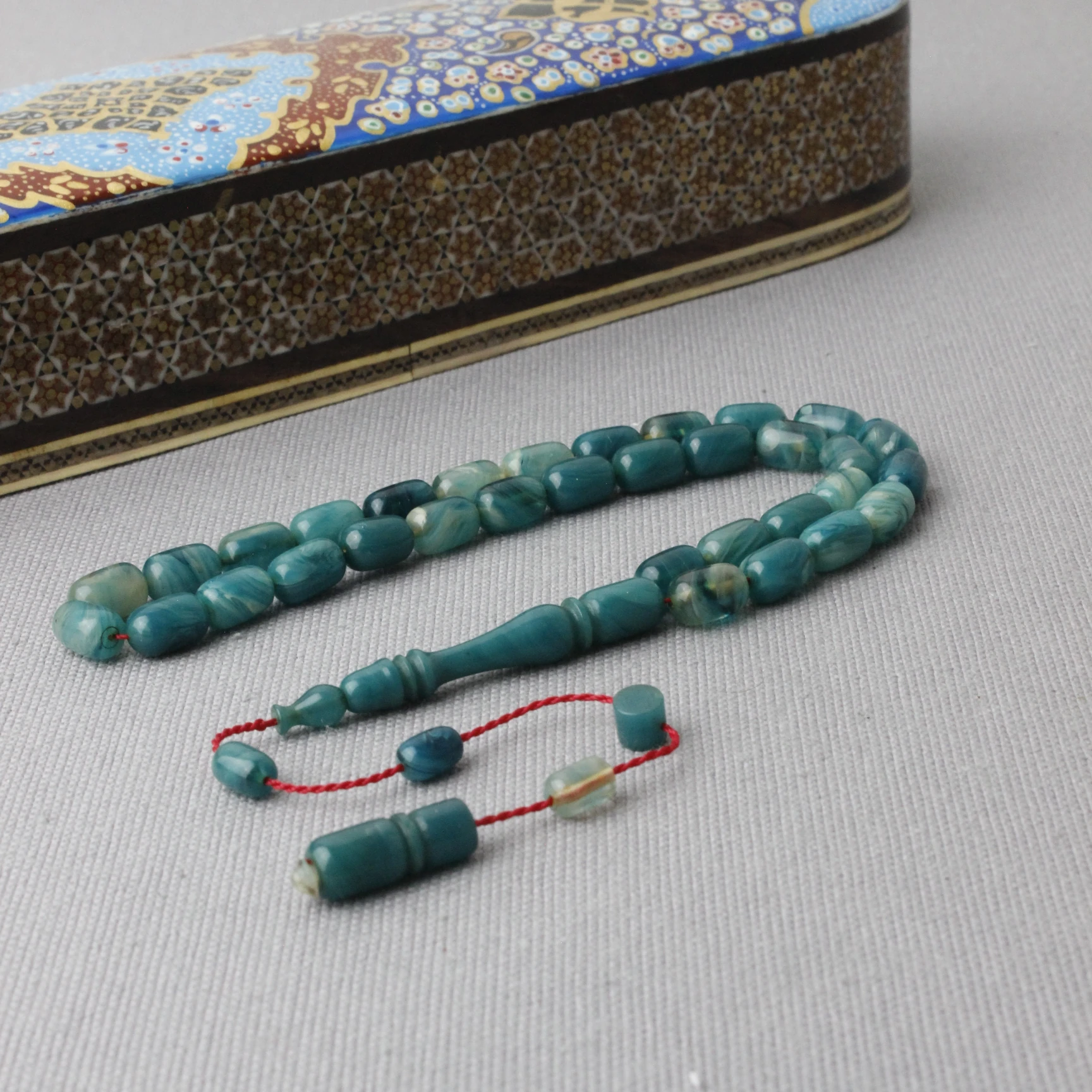 Deniz Mavisi Hareli Kapsül Kesim Sıkma Kehribar Tespih