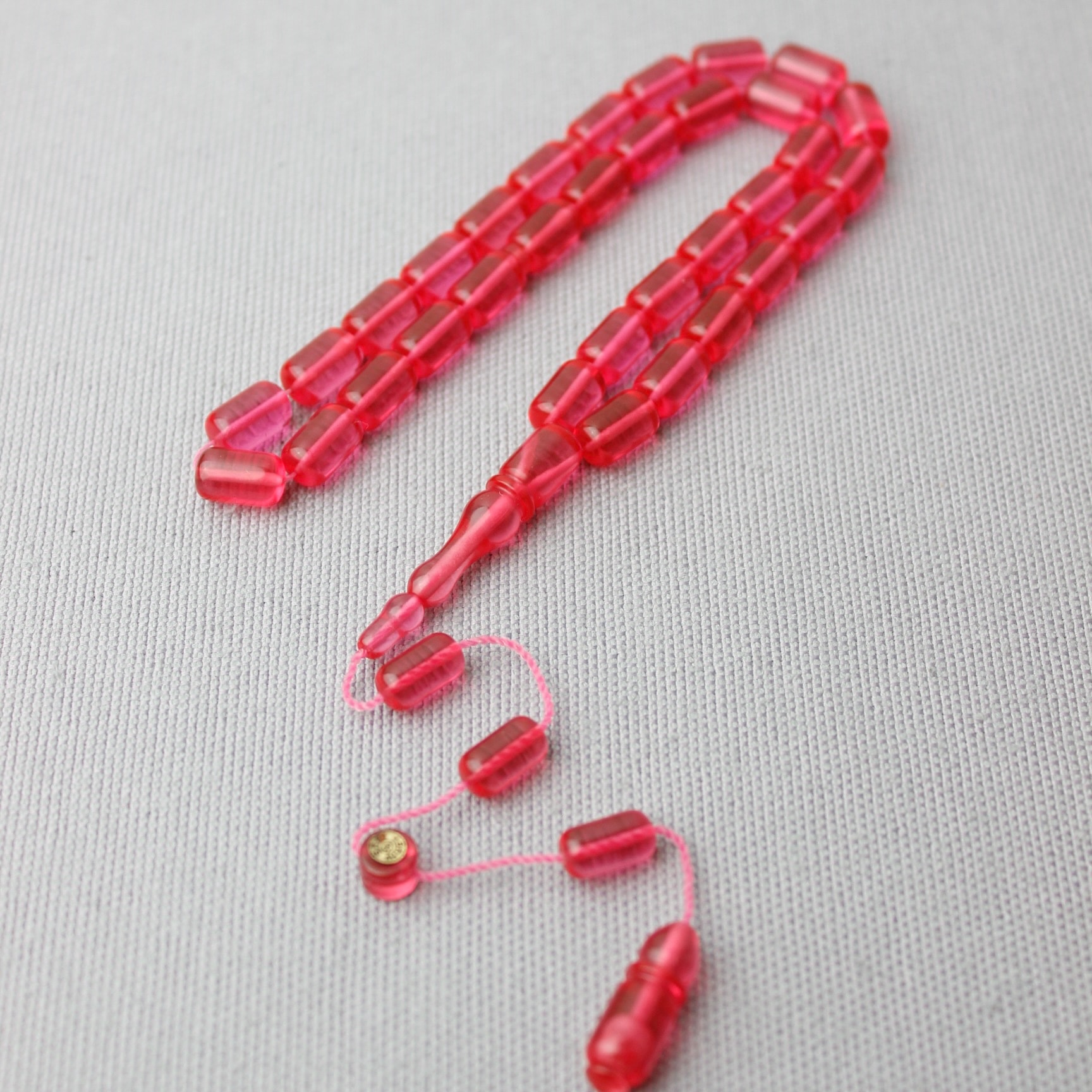 Sarı Ahmet Usta İmzalı Neon Pembe Sıkma Kehribar Tespih