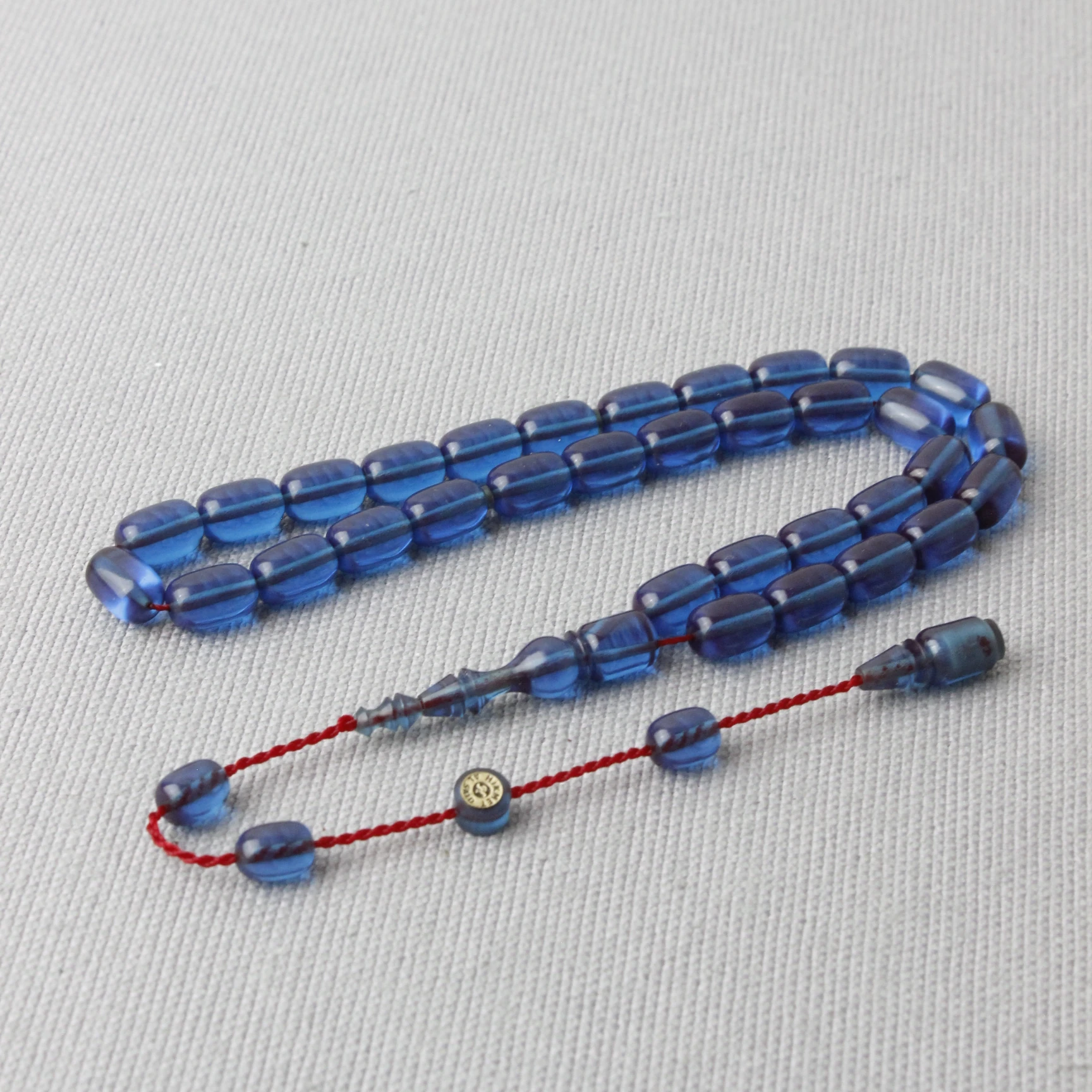 El Boy Usta İmzalı Kapsül Kesim Mavi Renk Sıkma Kehribar Tespih