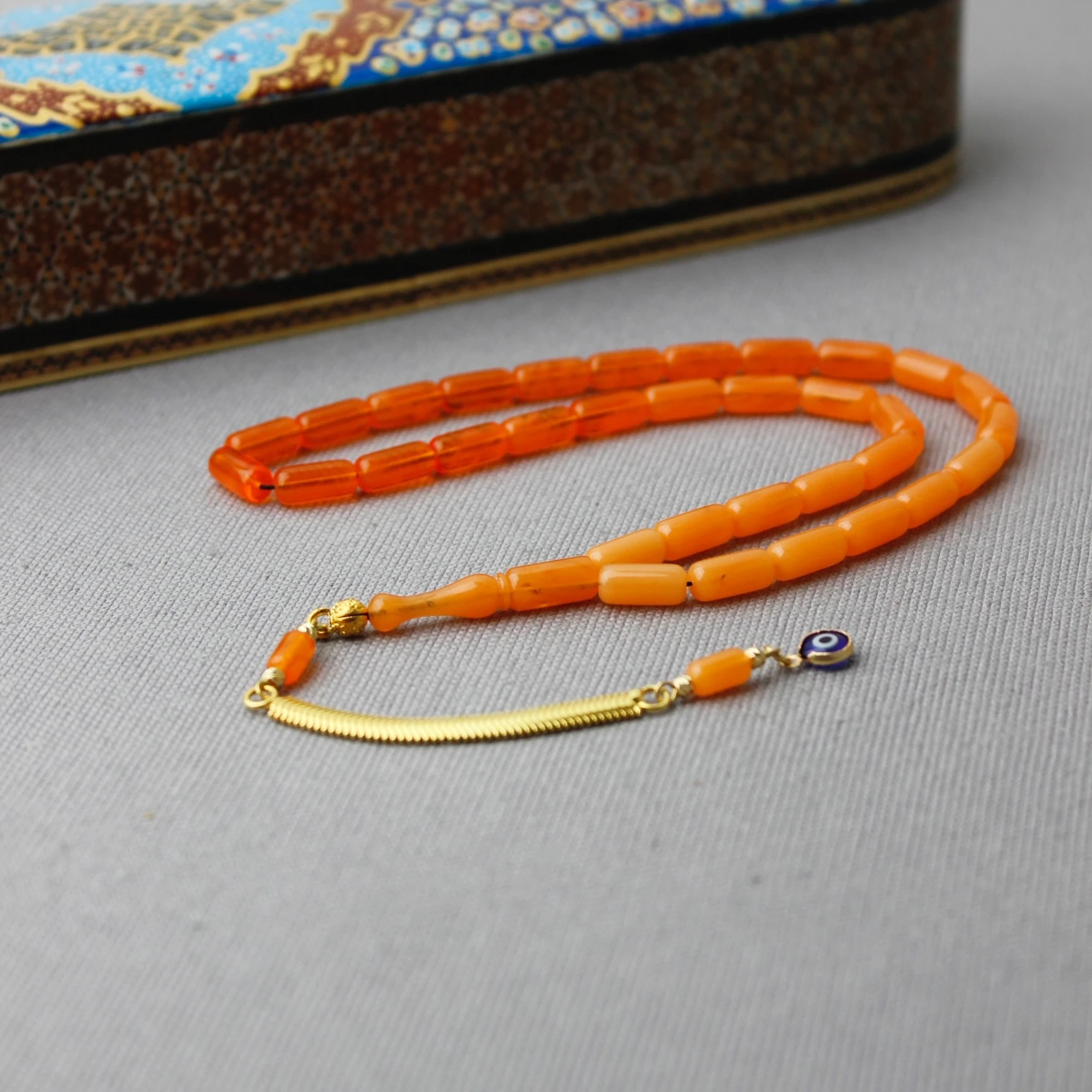 Kapsül Kesim Hareli Gümüş Püsküllü Portakal Renk Bakalit Tespih