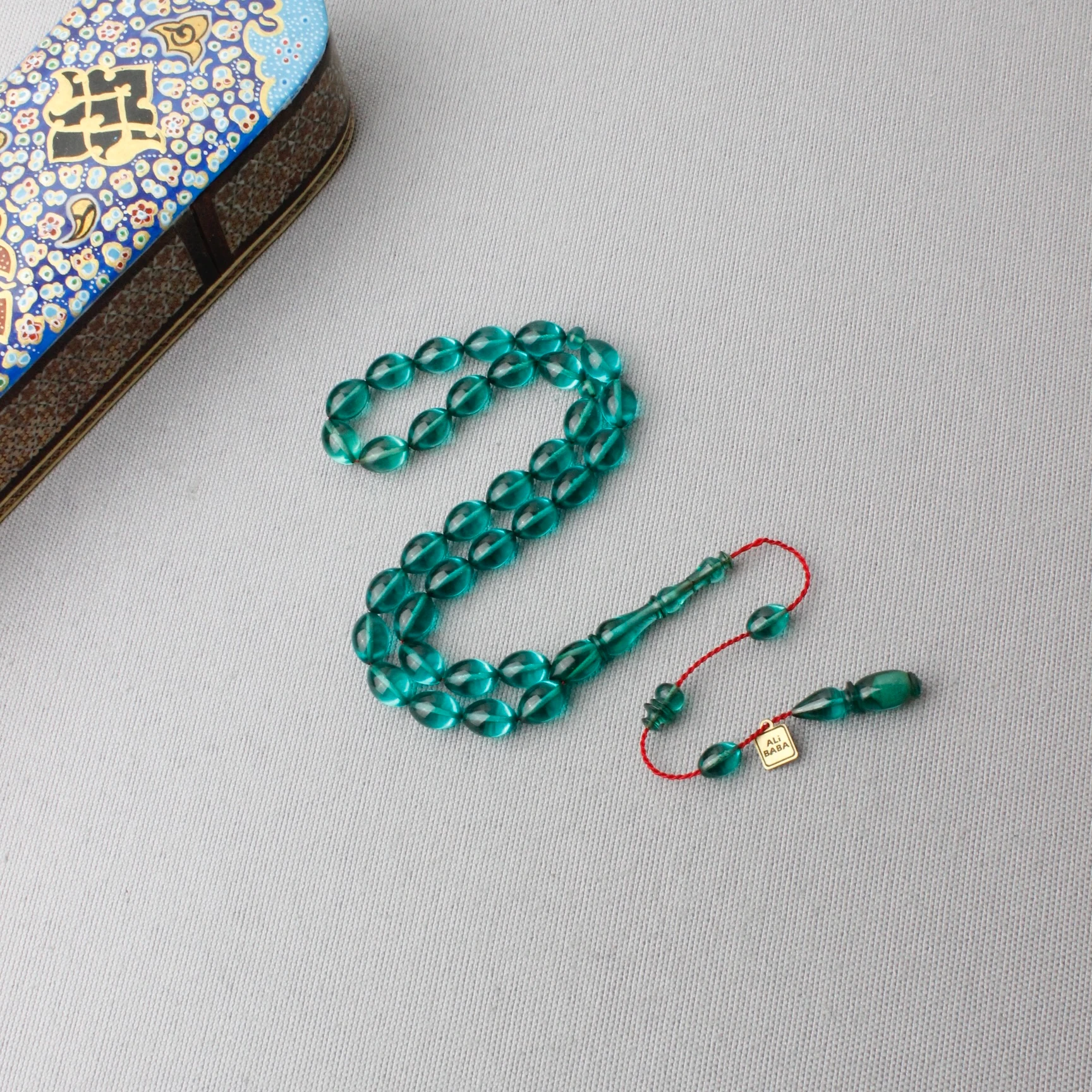 Ali Baba Usta İmzalı Beyzi Model Turkuaz Renk Sıkma Kehribar Tespih