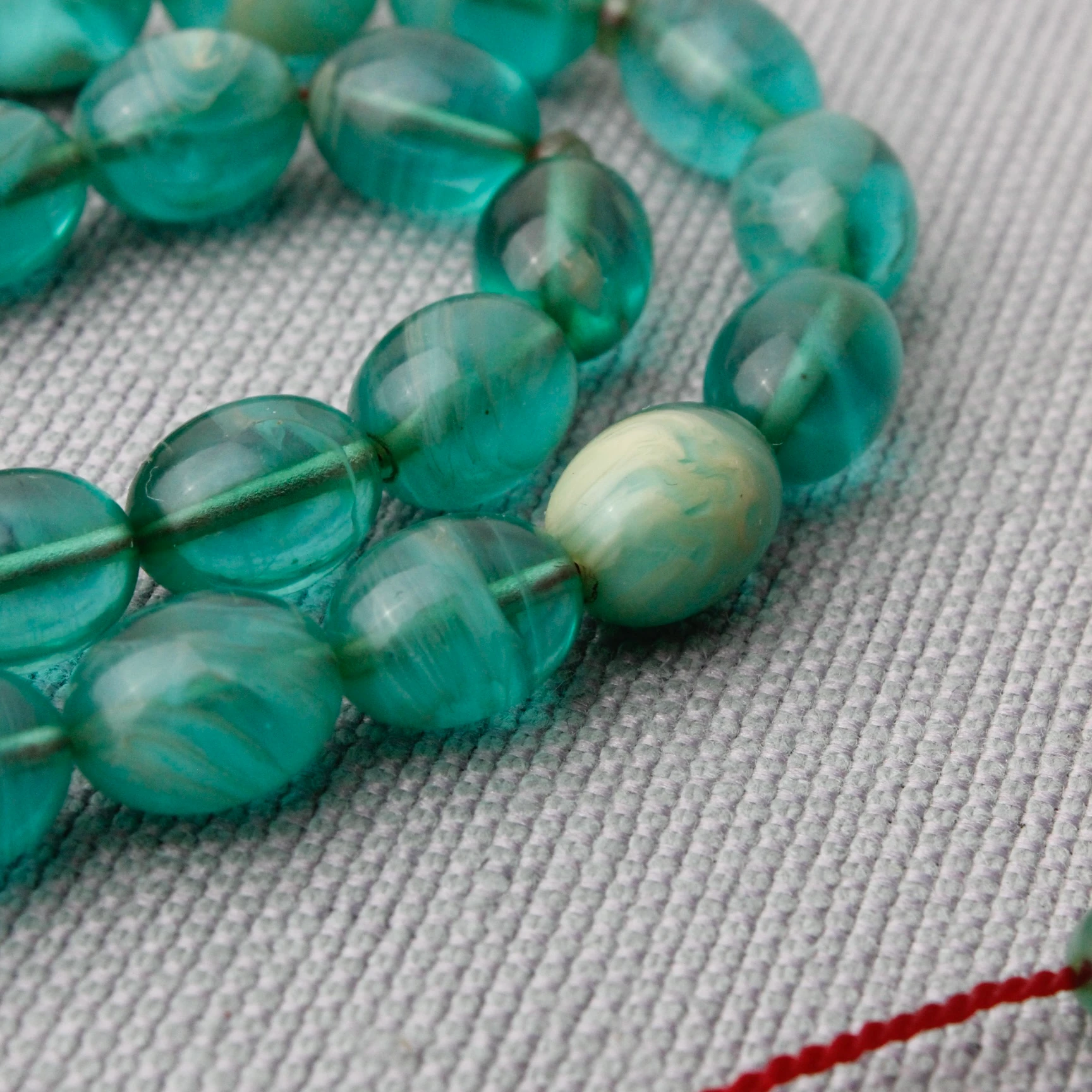 Hareli Turkuaz Renk Tacir İmzalı Sıkma Kehribar Tespih