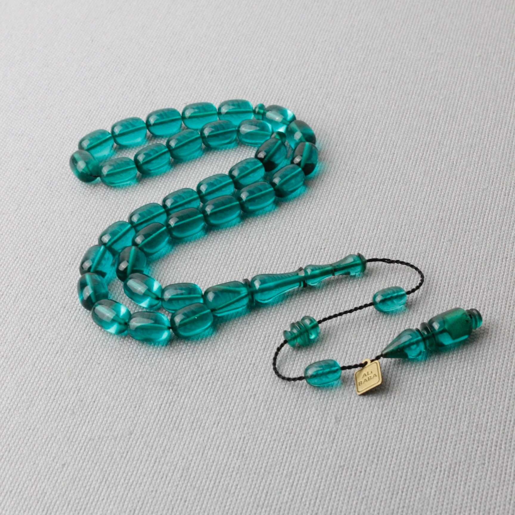 Ali Baba Usta İmzalı Gökyüzü Mavisi Kapsül Kesim Ateş Kehribar Tespih