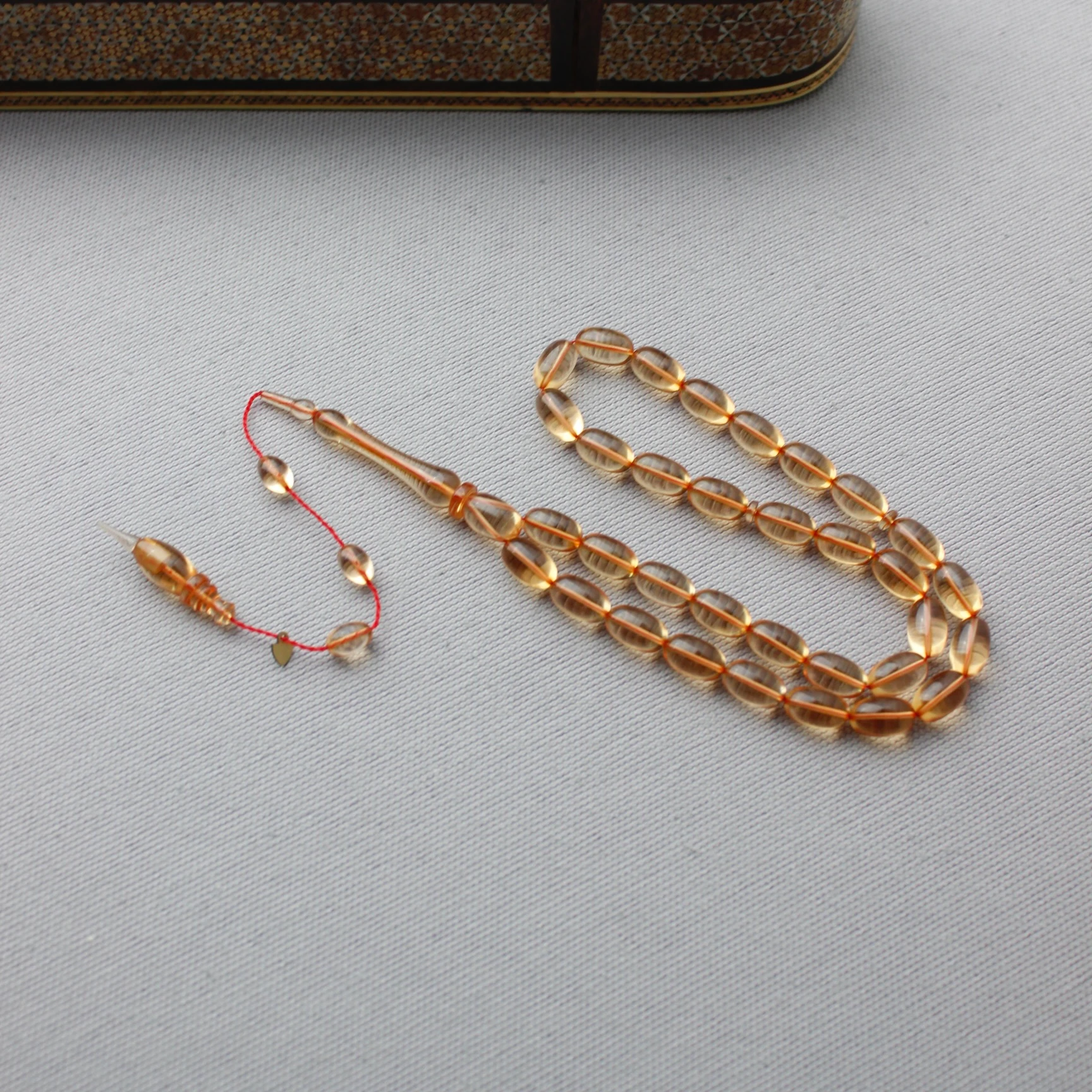 Serkan Başkan Usta İmzalı Şeffaf Renk Badem Model Ateş Kehribar Tespih