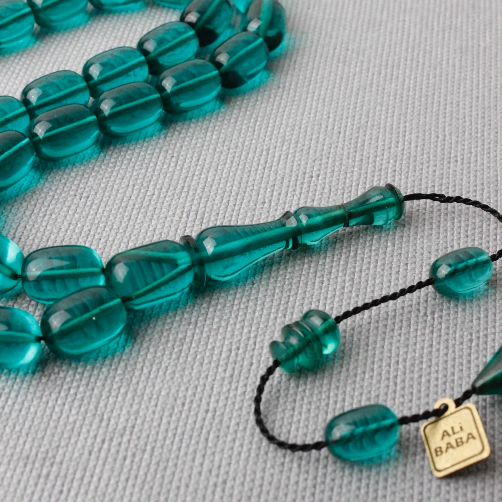 Ali Baba Usta İmzalı Gökyüzü Mavisi Kapsül Kesim Ateş Kehribar Tespih