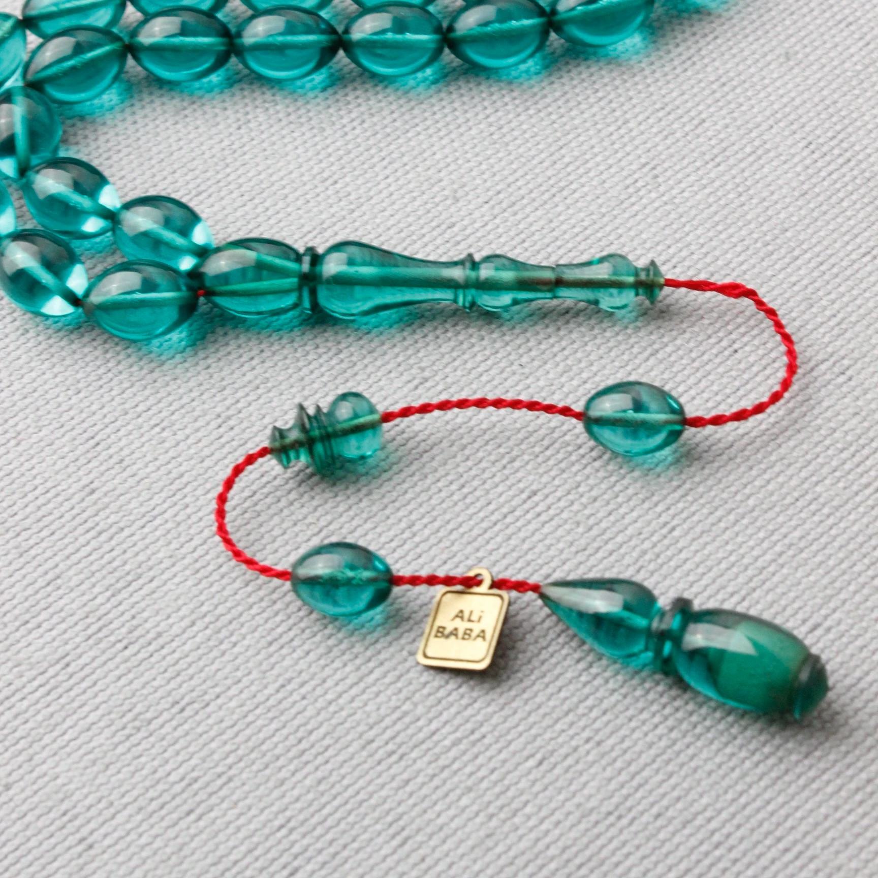 Ali Baba Usta İmzalı Beyzi Model Turkuaz Renk Sıkma Kehribar Tespih