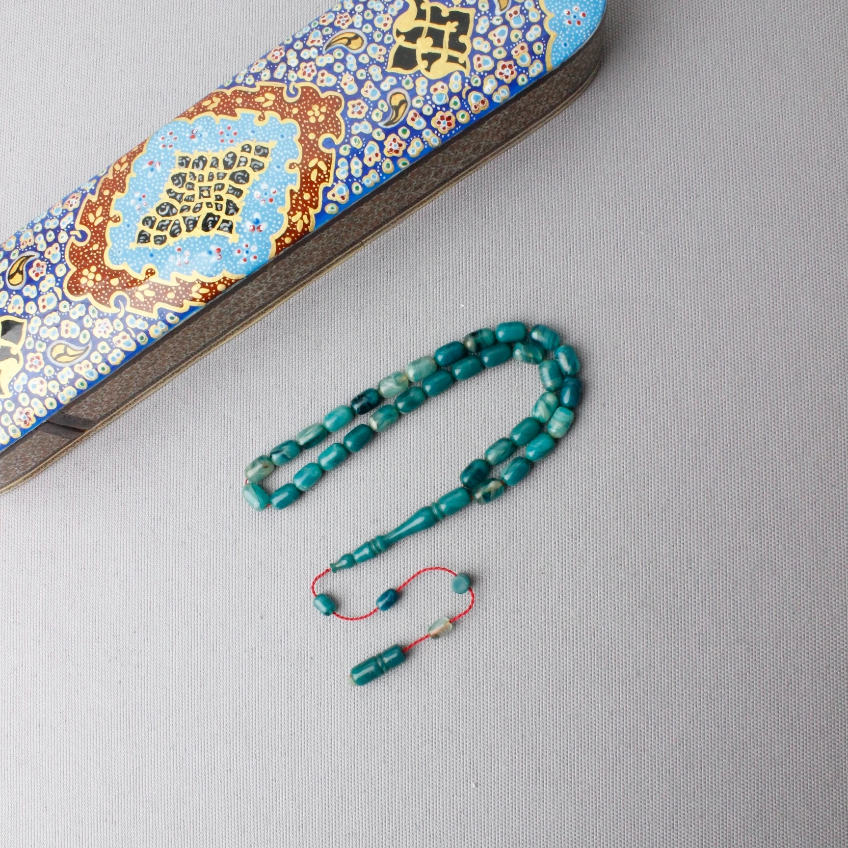 Deniz Mavisi Hareli Kapsül Kesim Sıkma Kehribar Tespih