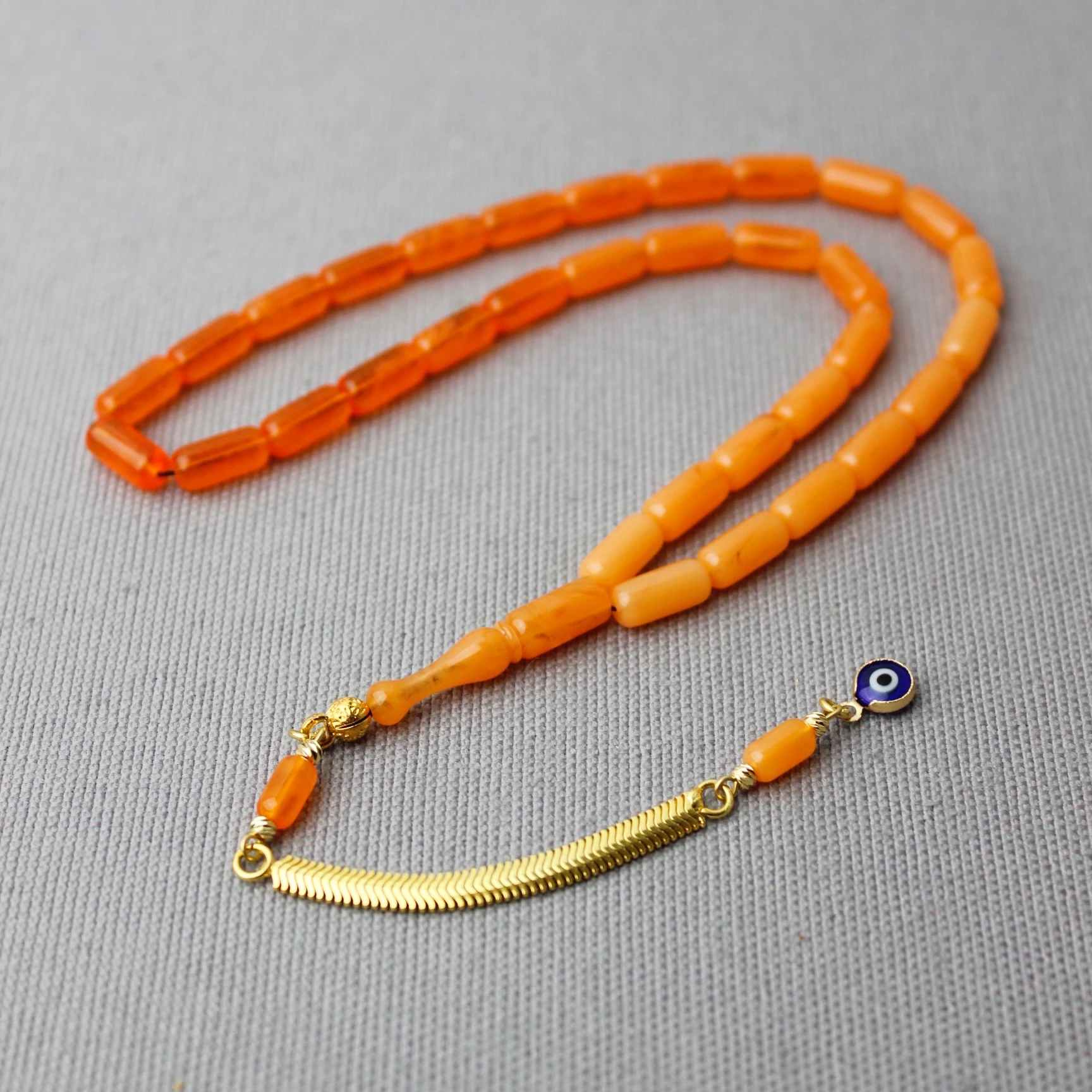 Kapsül Kesim Hareli Gümüş Püsküllü Portakal Renk Bakalit Tespih