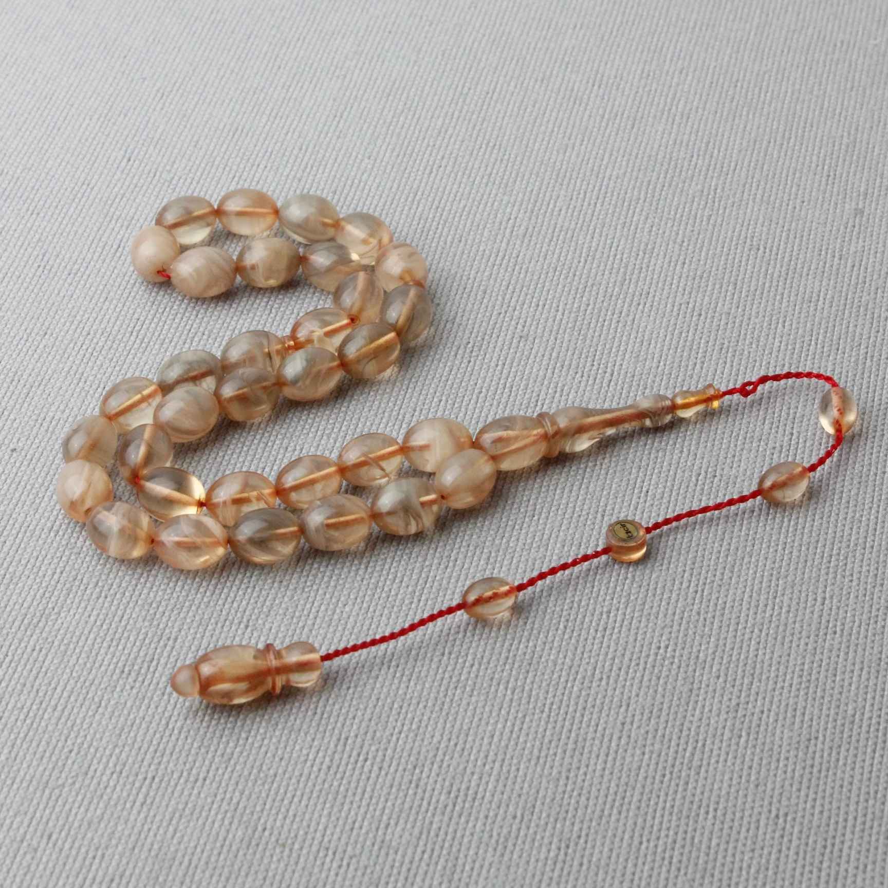 Beyaz Hamur Hareli Beyzi Model Tacir Usta İmzalı Sıkma Kehribar Tespih