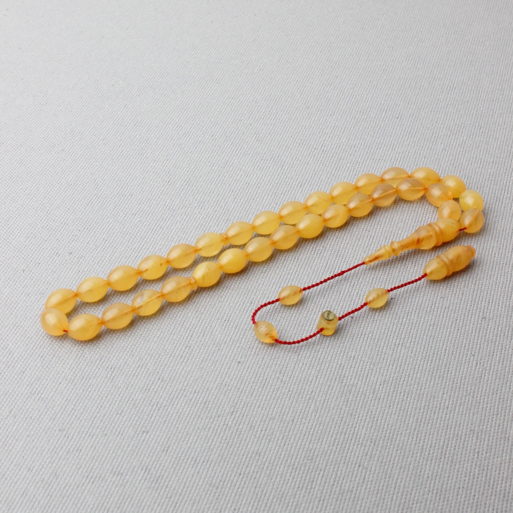 Tacir Usta İmzalı Beyzi Model Hareli Sıkma Kehribar Tespih