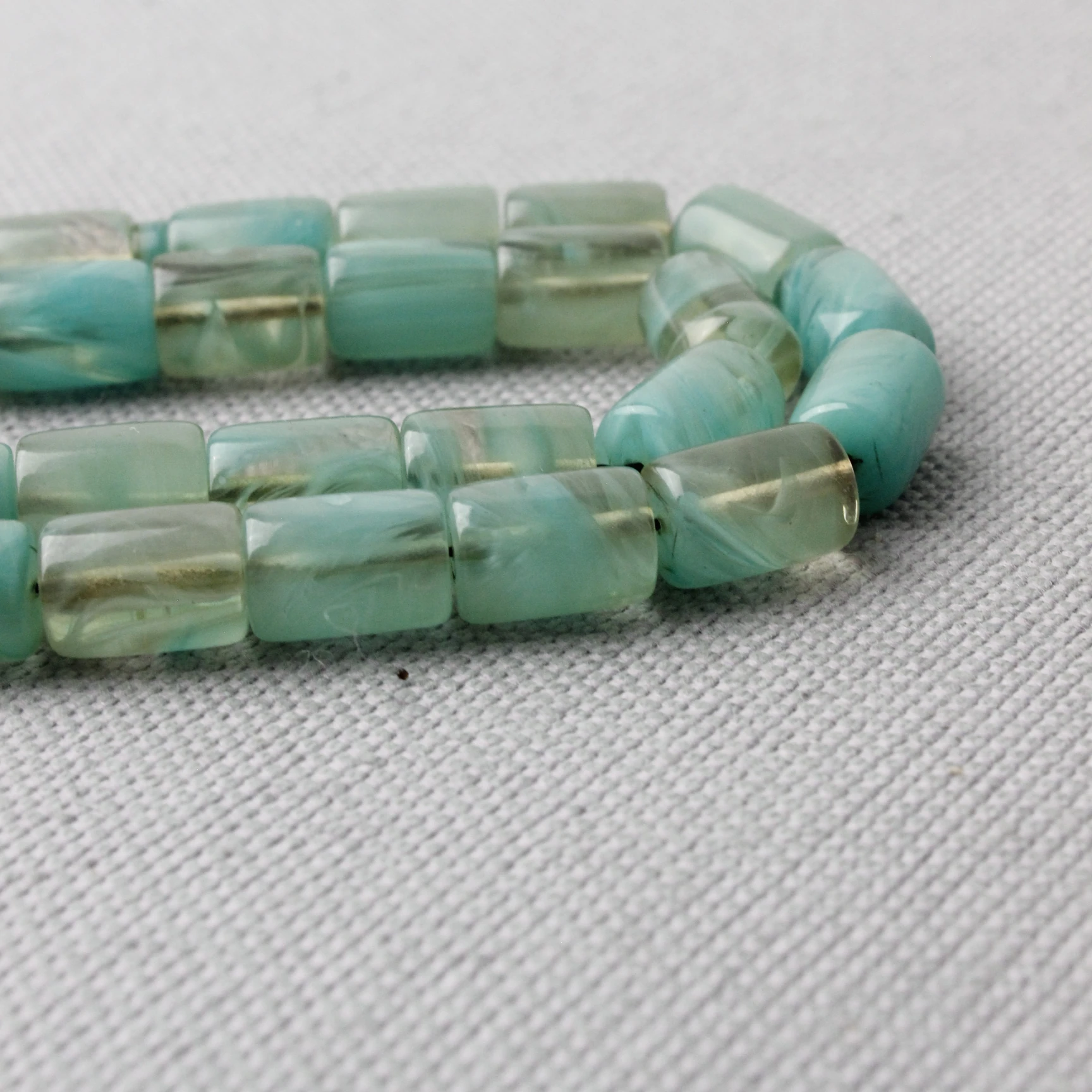 Ayhan Turan Usta İmzalı Deniz Mavisi Hareli Kapsül Kesim Sıkma Kehribar Tespih