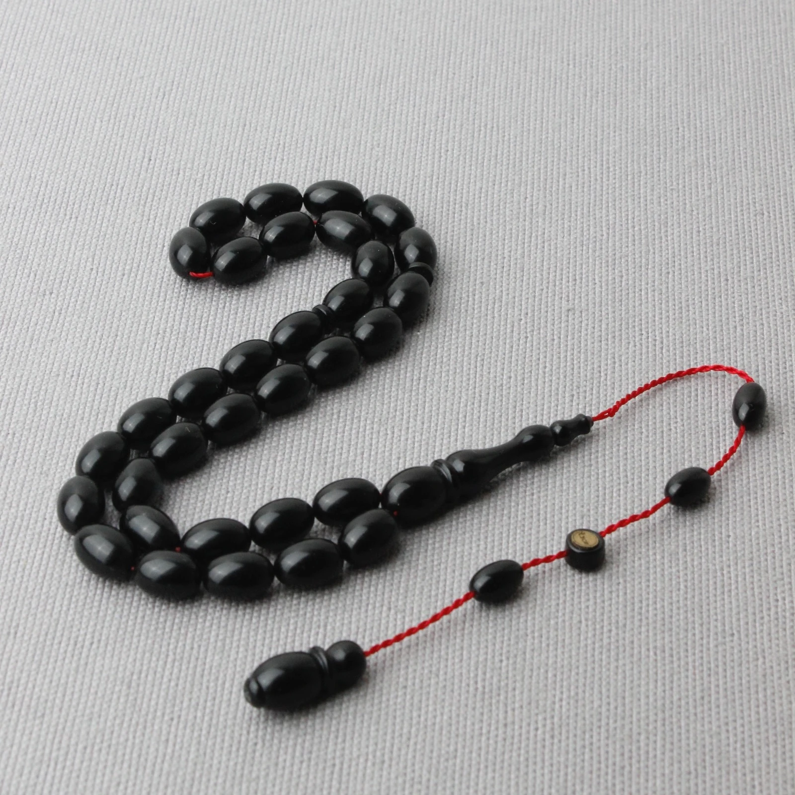 Siyah Renk Tacir Usta İmzalı Sıkma Kehribar Tespih