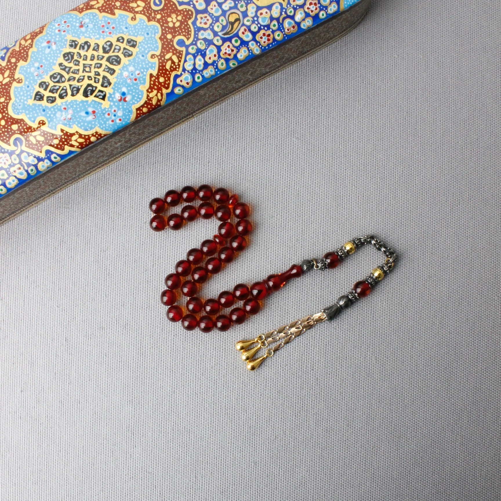 Küre Kesim Çelik Püsküllü Ateş Kehribar Tespih 