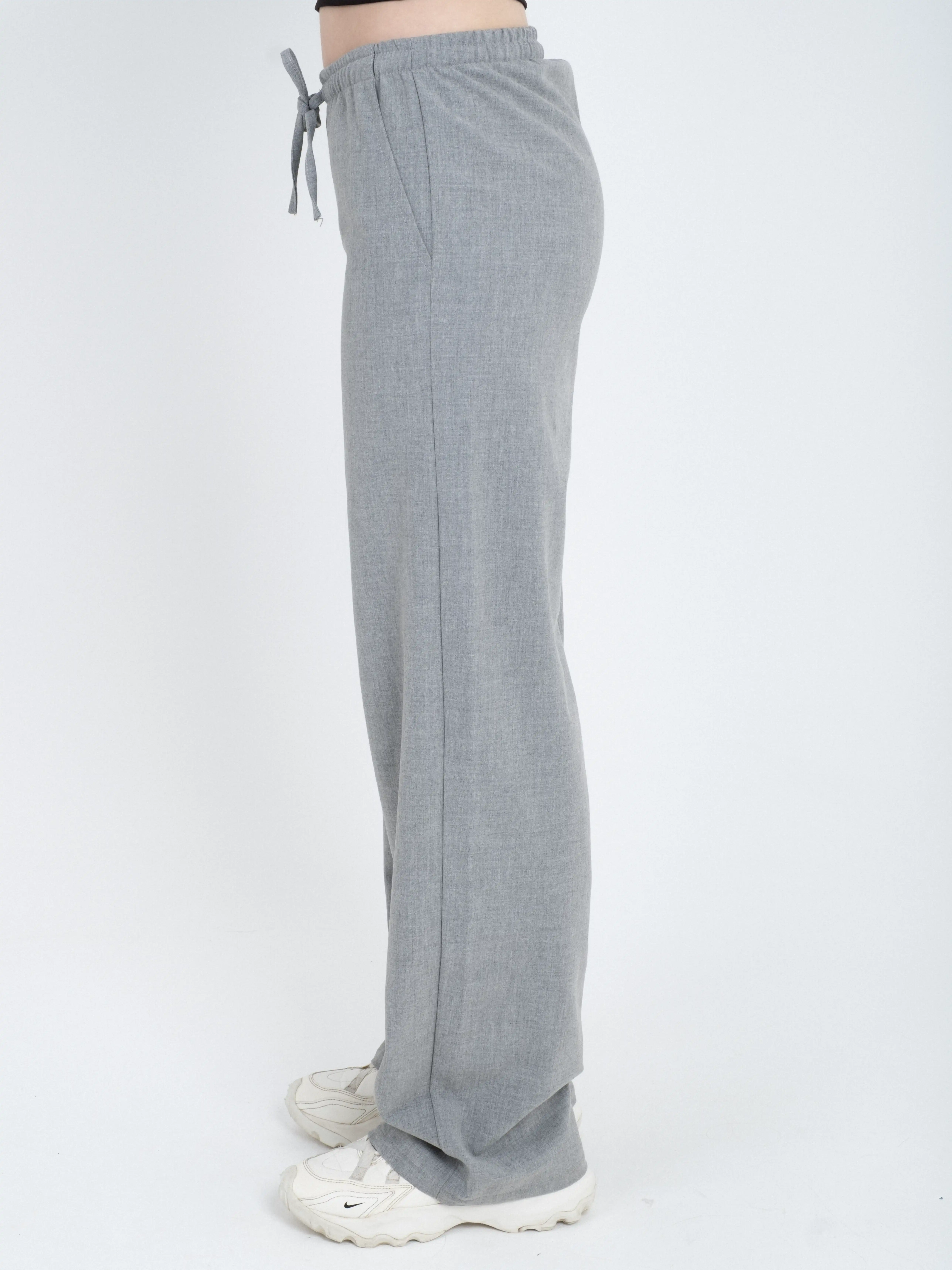 Dökümlü Geniş Paça Kumaş Pantolon