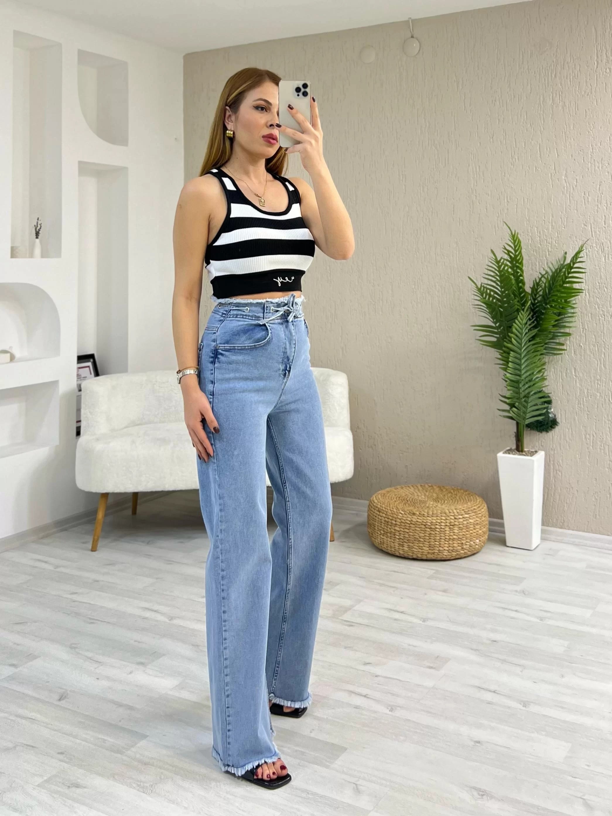 Paça Püsküllü Lazer Kesim Kot Pantolon
