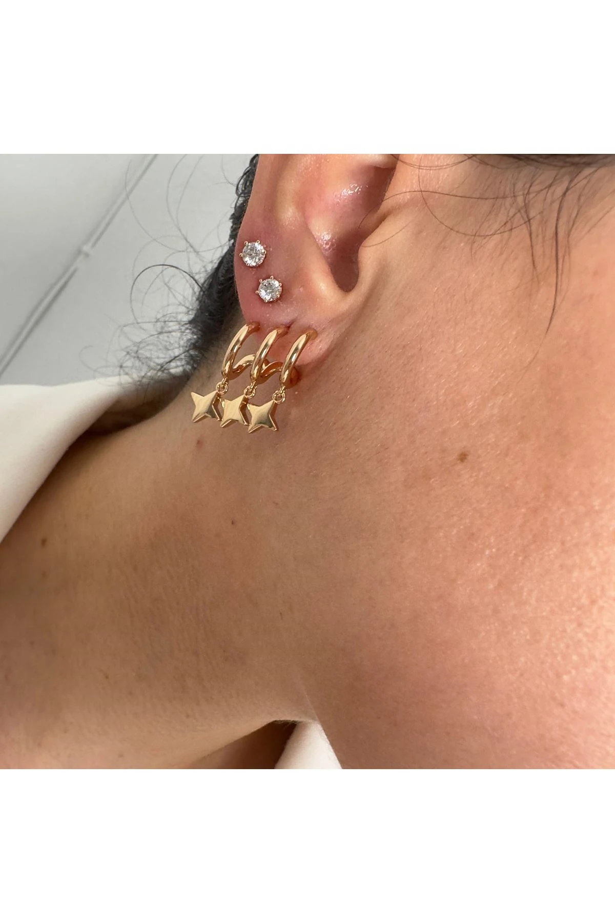 18K Rose Gold Renkli Üç Kulak Deliği Görünümlü Kutup Yıldızı Plaka Küpe