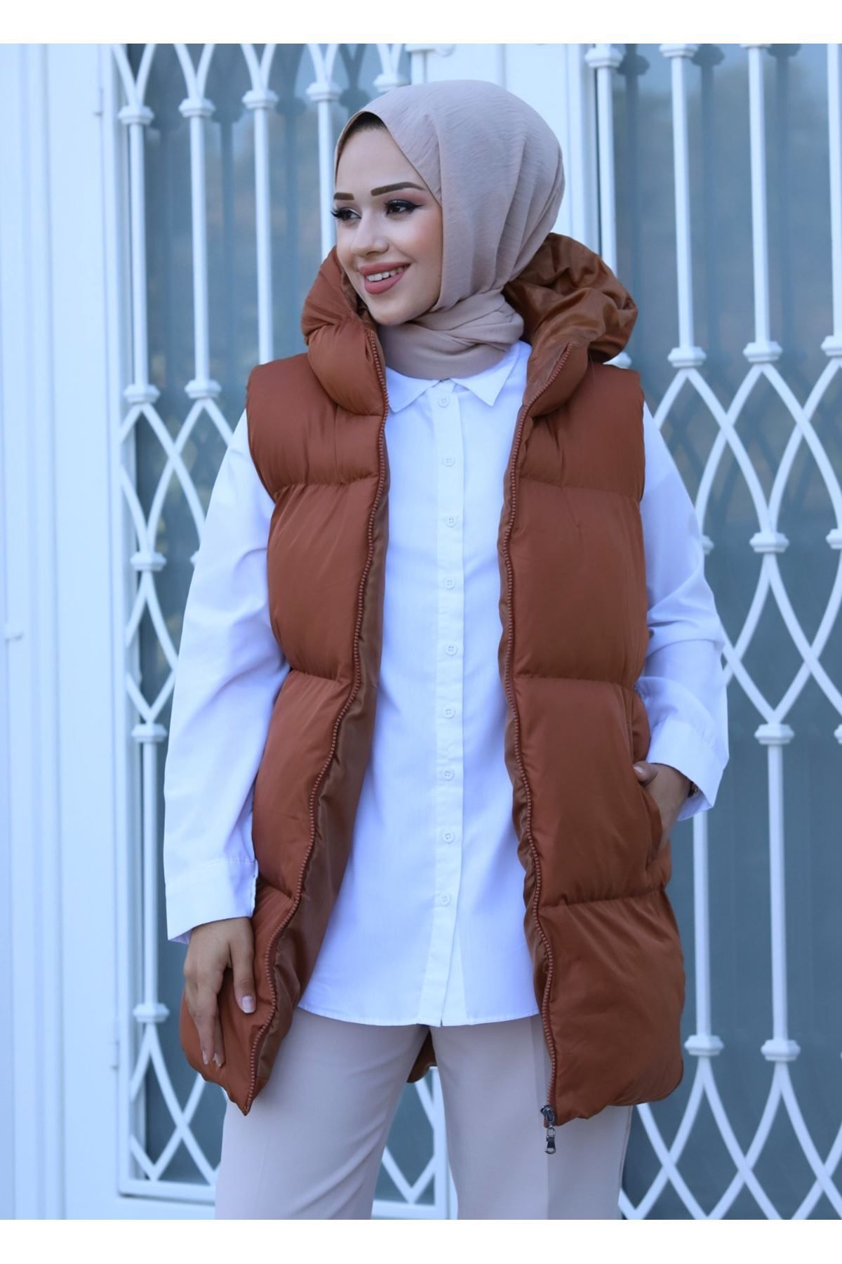 Dolgulu Kapüşonlu Su İtici Kadın Şişme Yelek