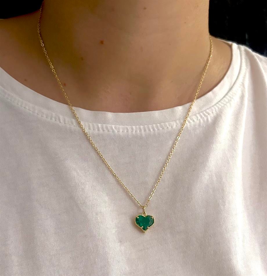 Female emerald green stone heart necklace