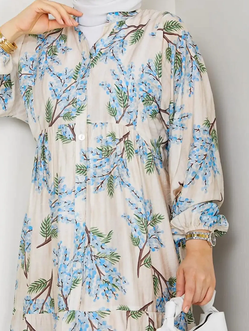 Yarım Düğmeli Eteği Katlı Çiçek Desenli Elbise