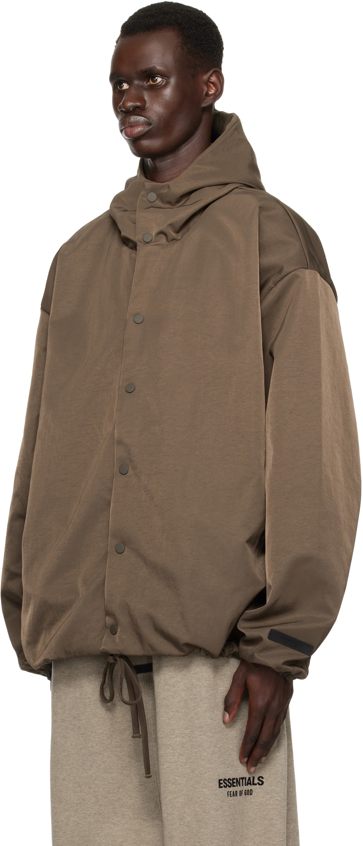 Fear of God Essentials Textured Nylon Hooded Coaches Jacket 'Brown'