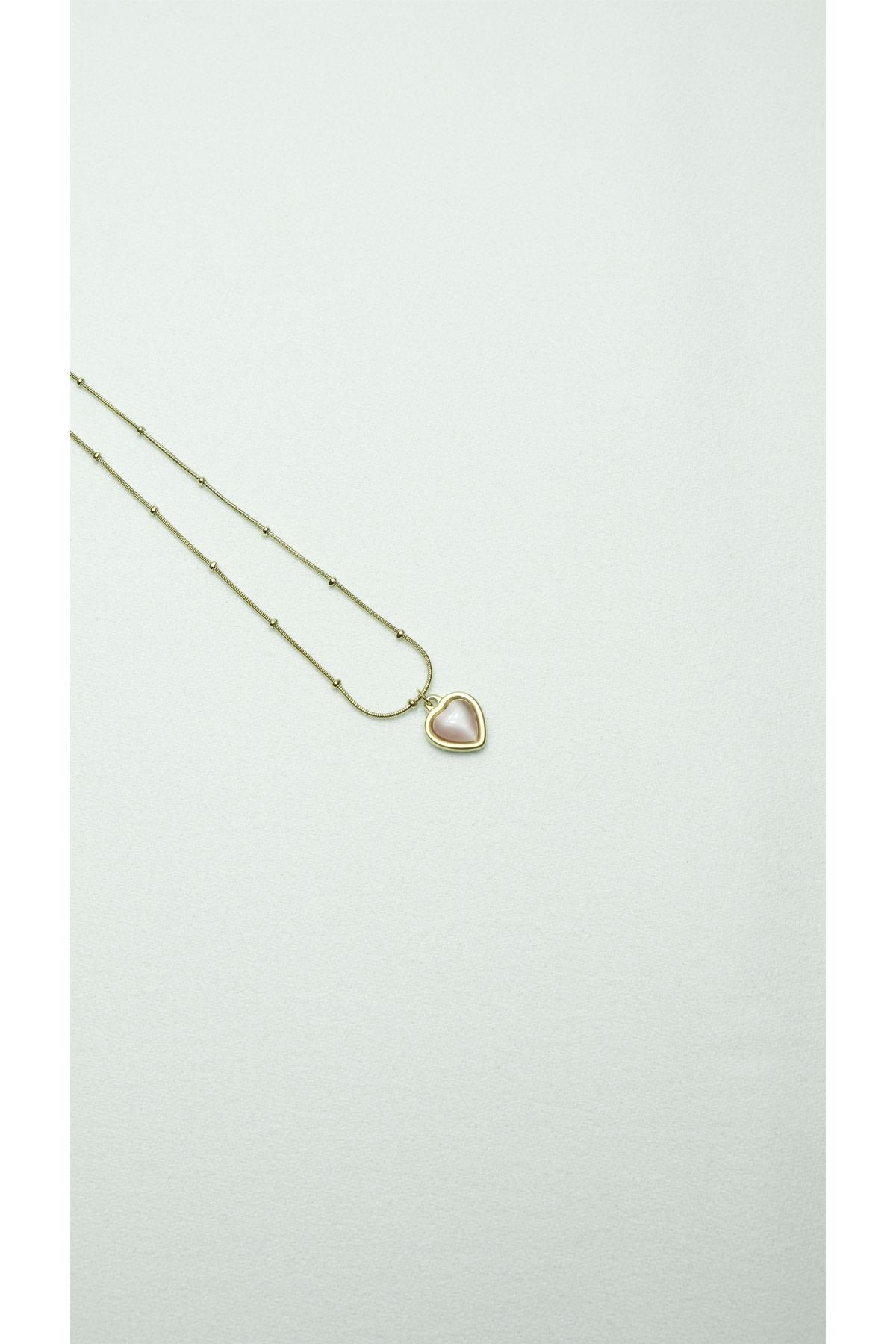 ÇELİK PEMBE TAŞLI KALPLİ MİNİMAL GOLD KOLYE