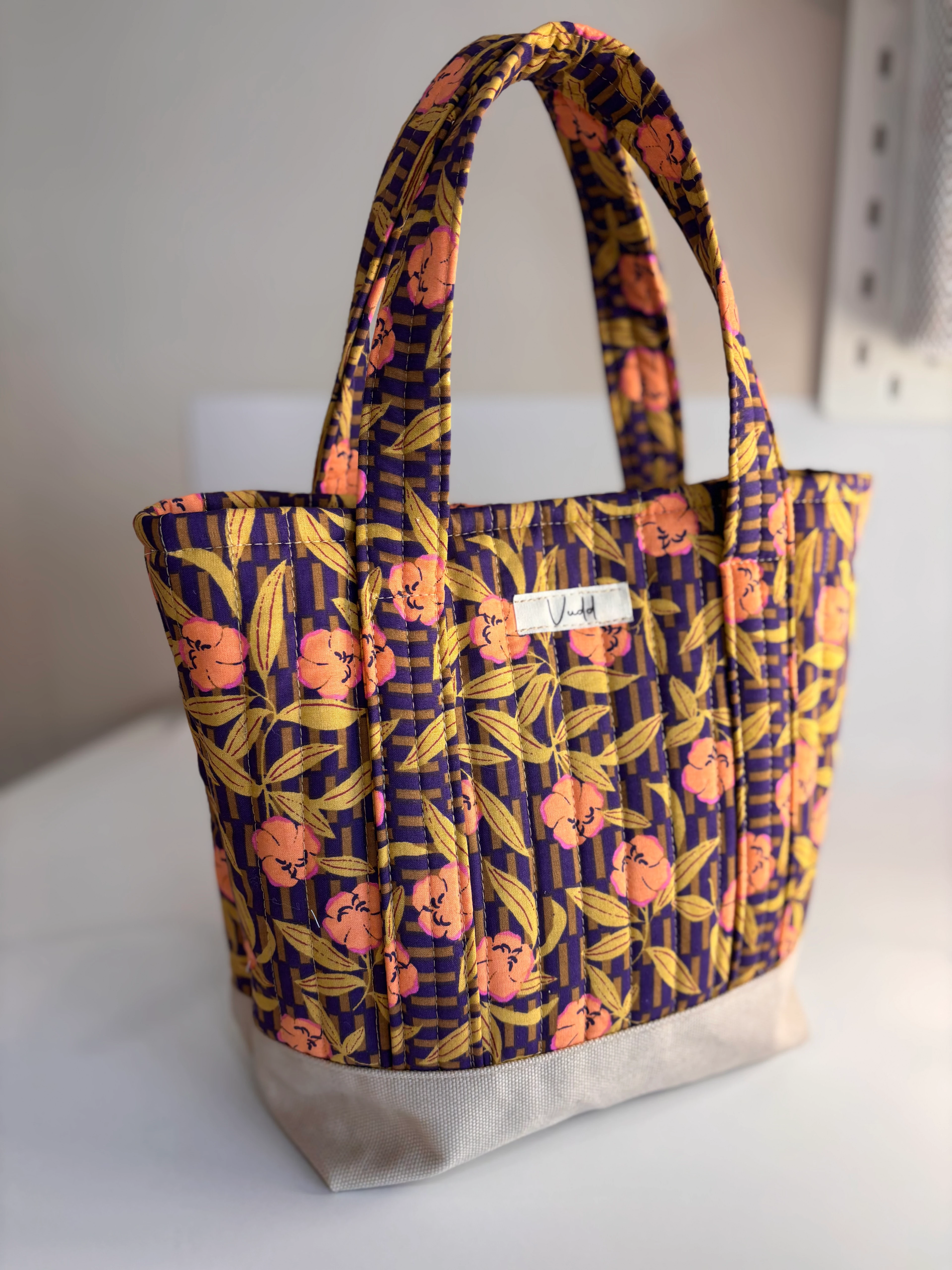 kapitone çiçekli el çantası