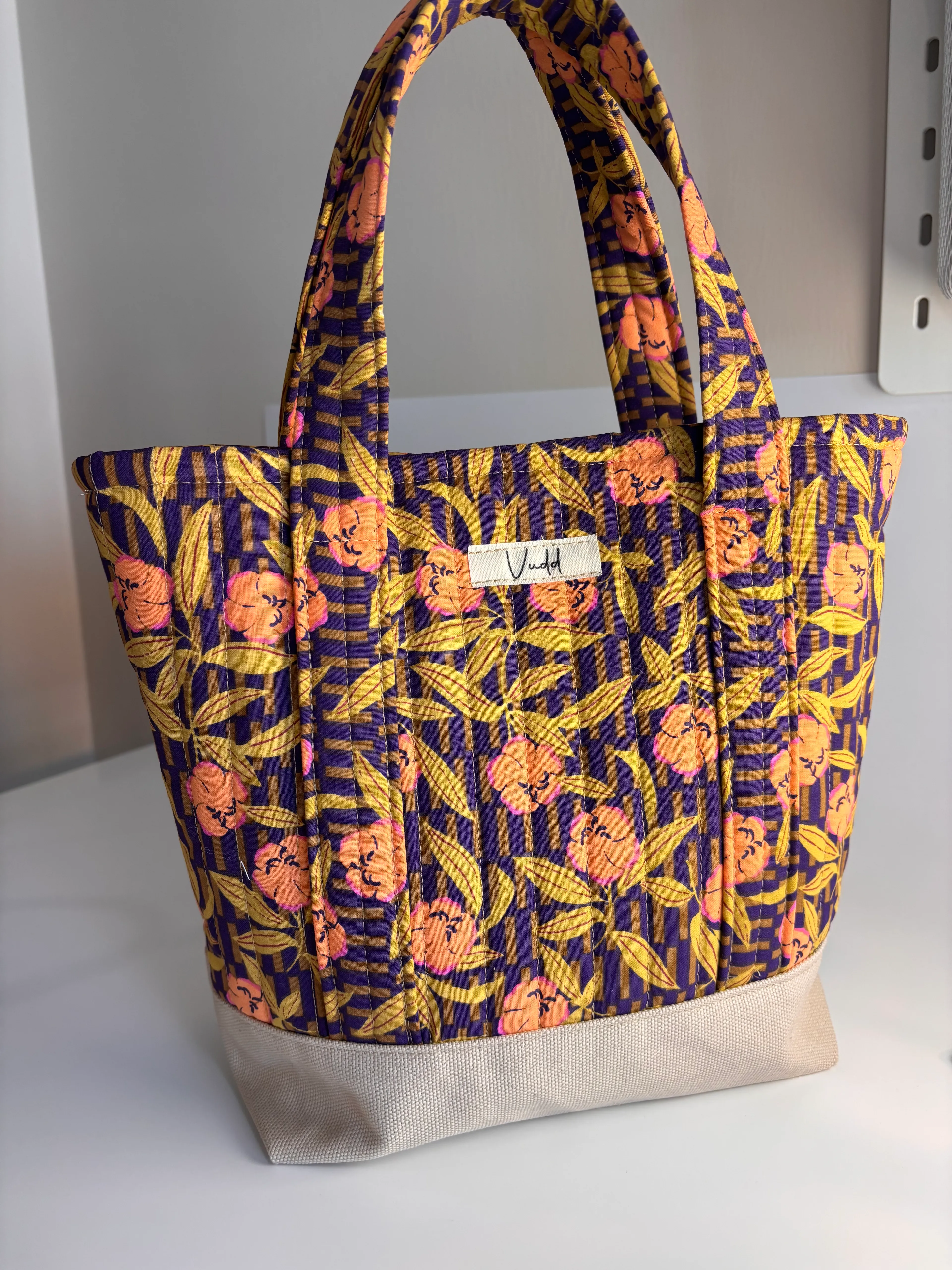 kapitone çiçekli el çantası