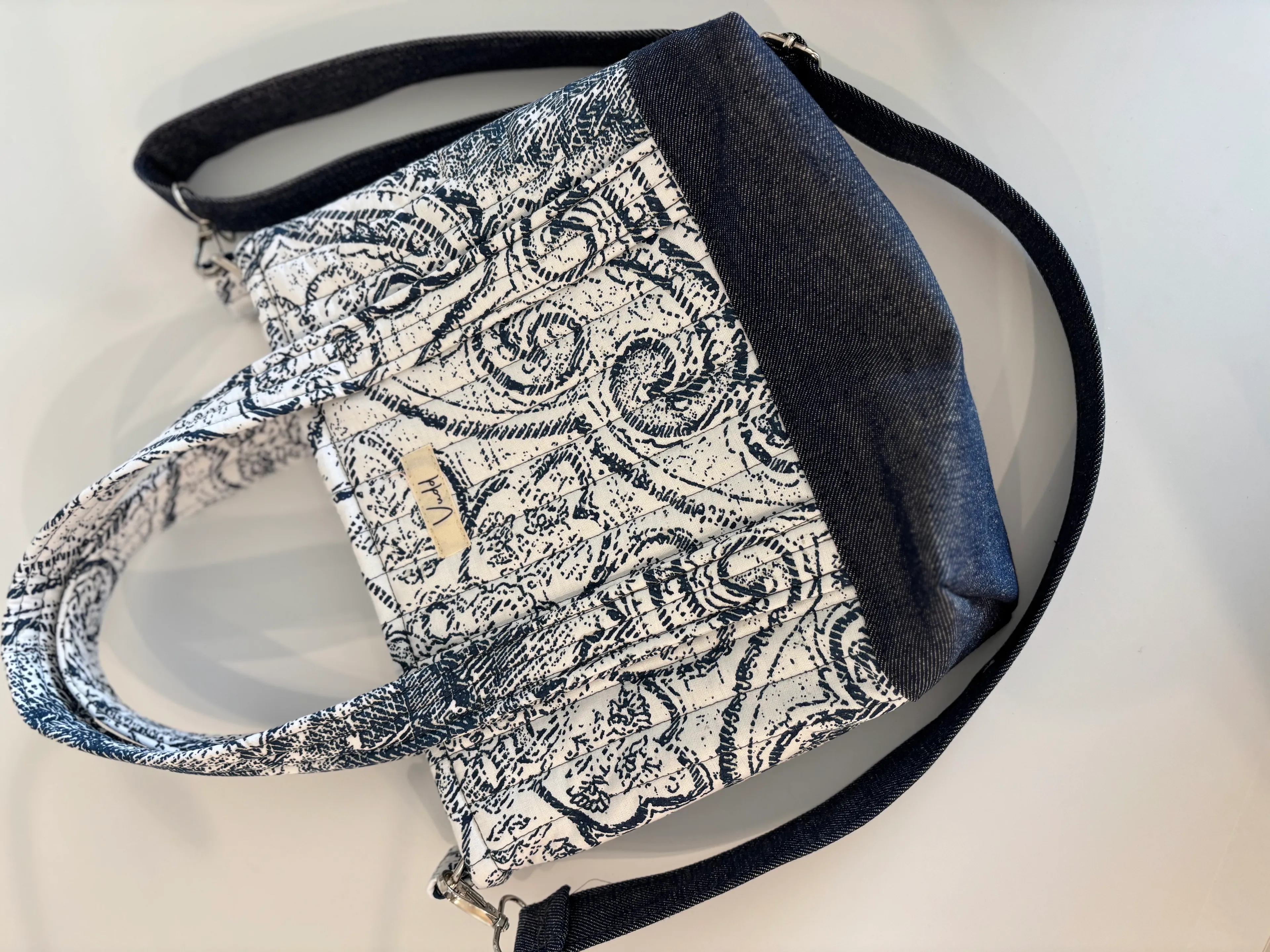 Denim kapitone midi çanta