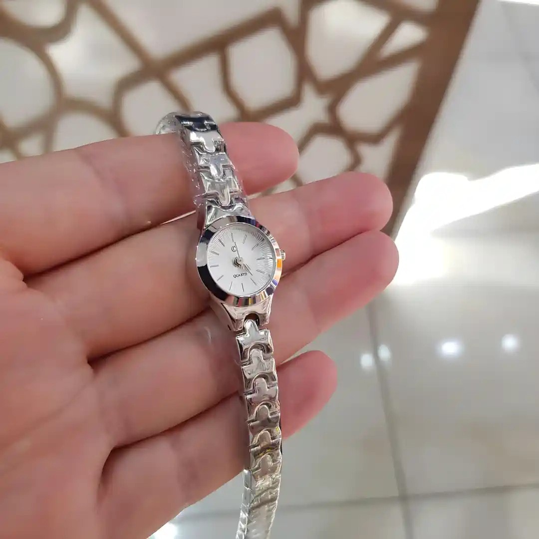Puzzle Özel Tasarım Desenli Kordon Gümüş Renk Kadın Kol Saati (Beyaz Kadran)

