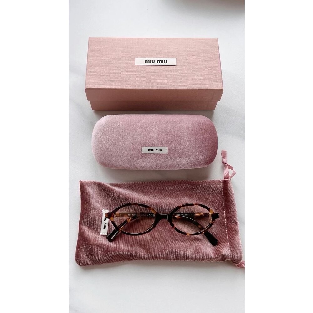 Miu Miu Oval Acetate SMU04Z