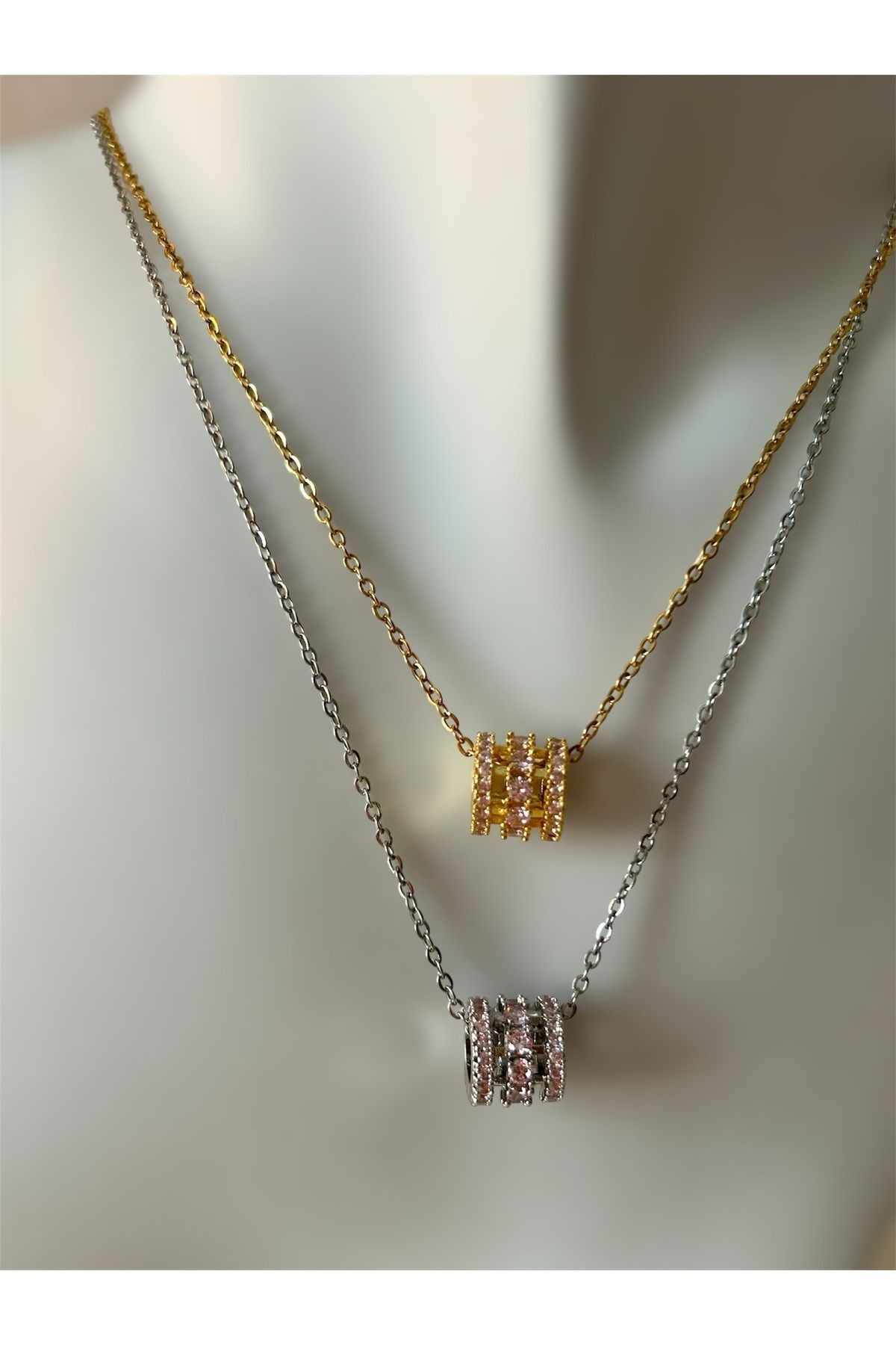 Pembe Taşlı Silindir Gold Çelik Kolye