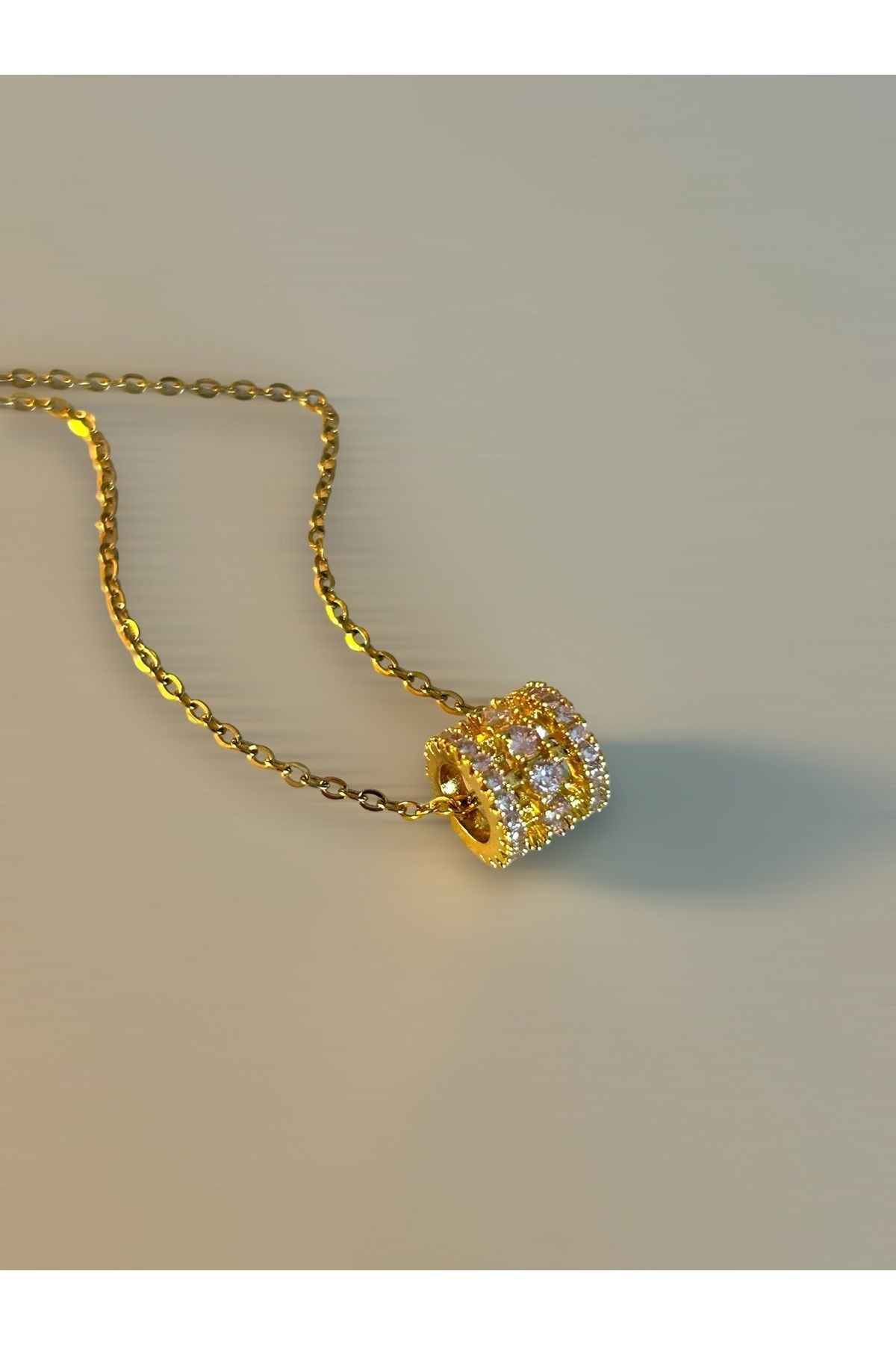 Pembe Taşlı Silindir Gold Çelik Kolye