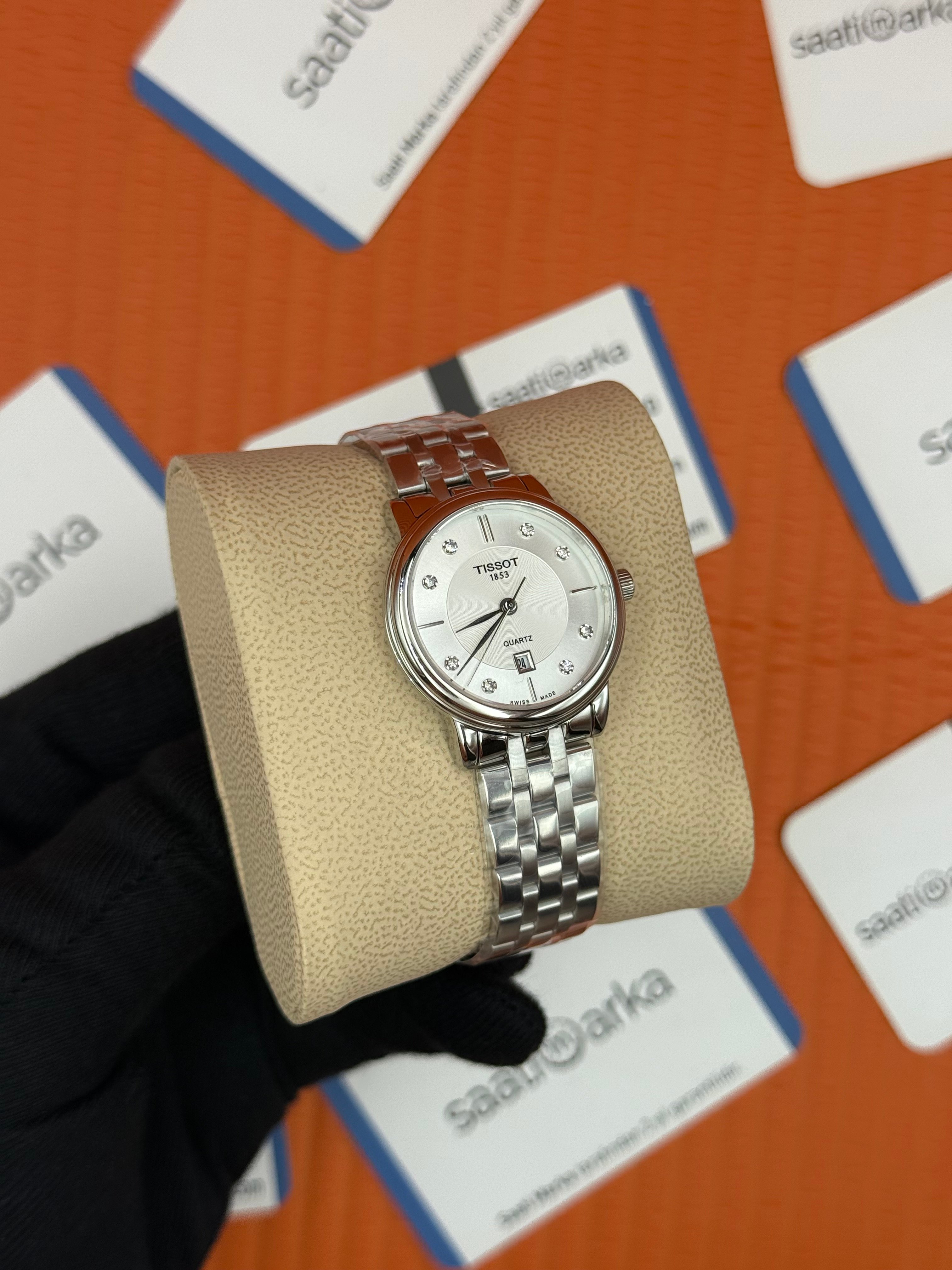 TISSOT beyaz baget taşllı kadran silver kasa kordon kadın kol saati