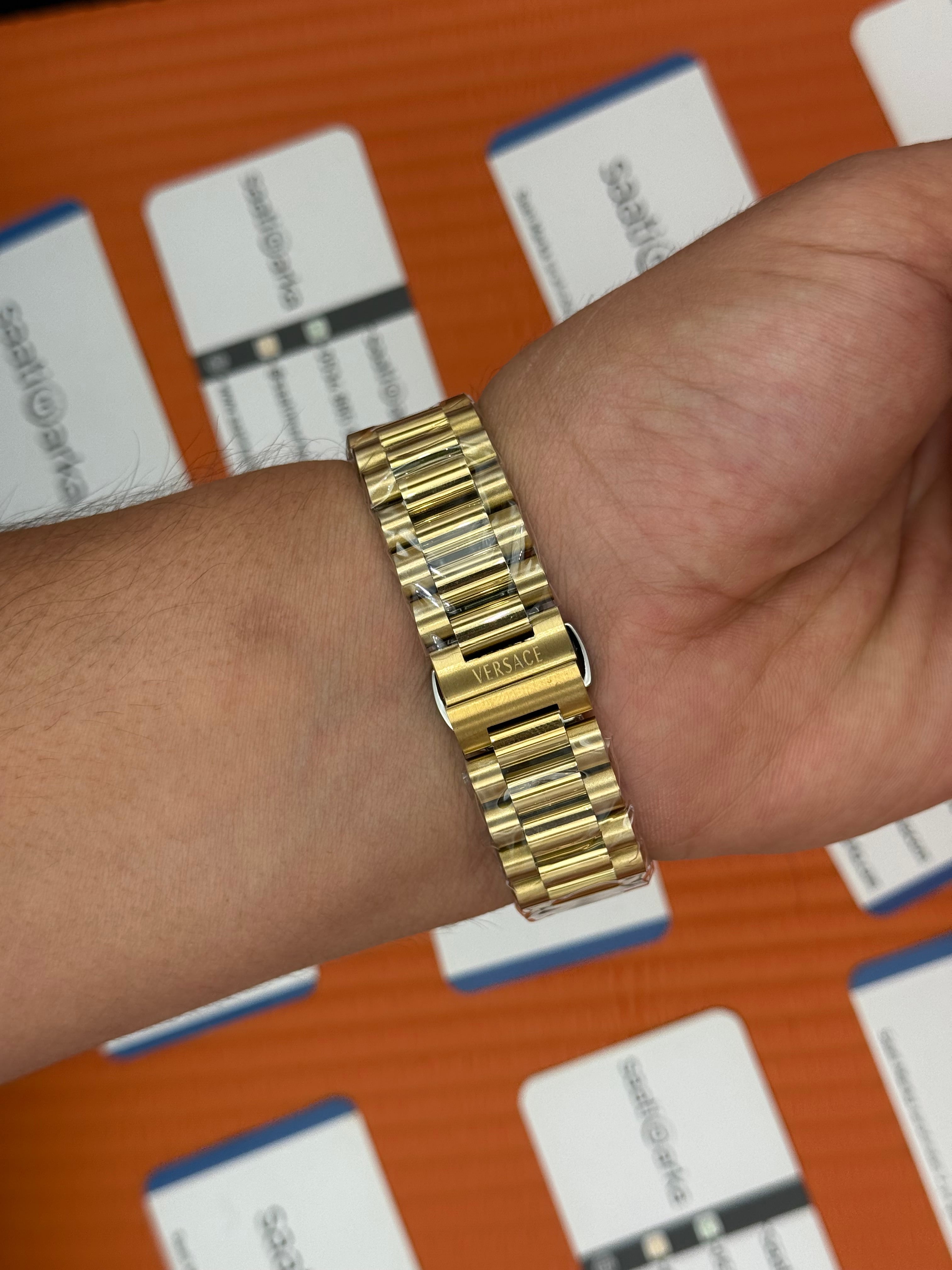 VERSACE 40mm turkuaz kadran gold kasa kordon erkek kol saati