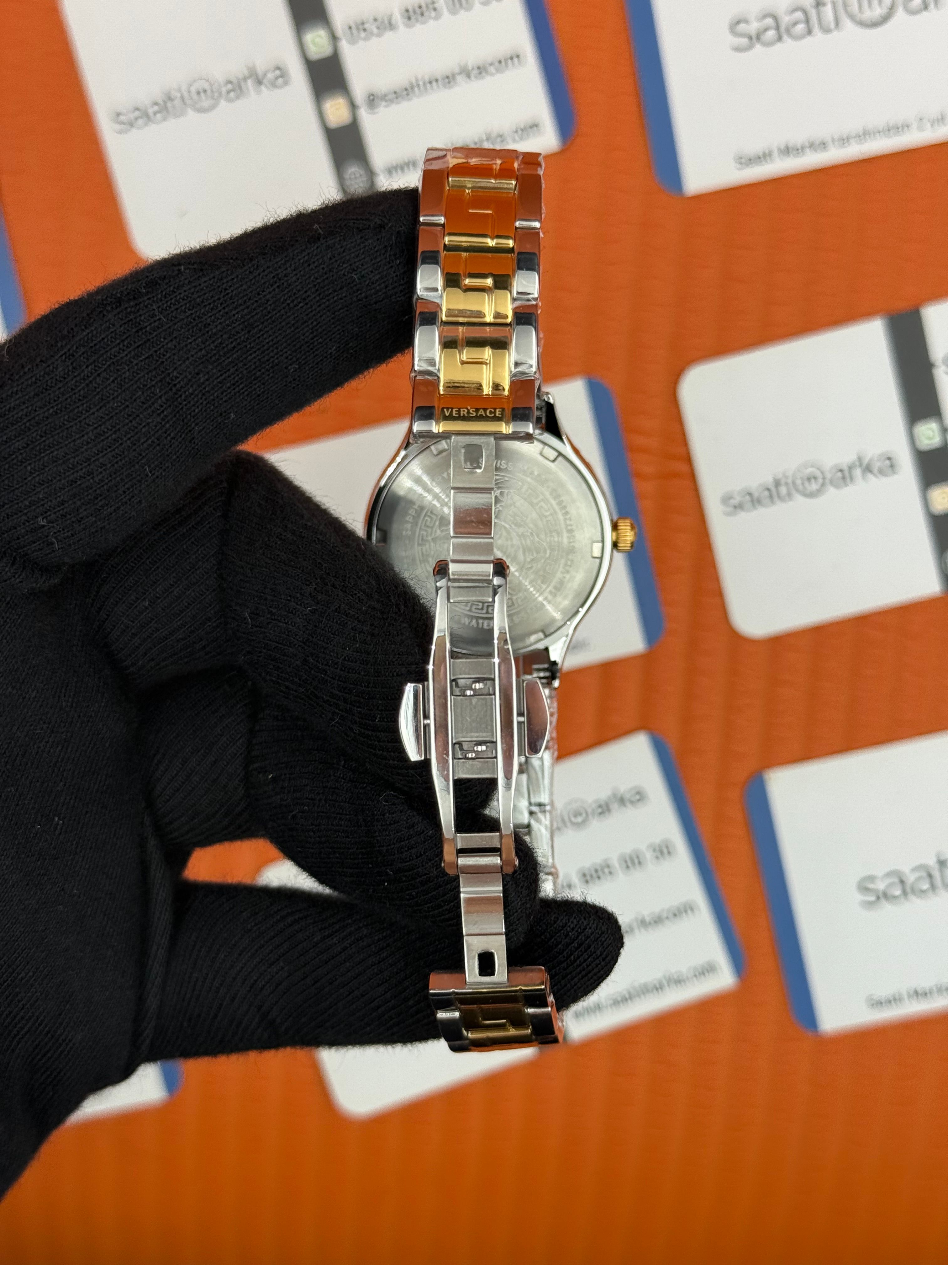VERSACE beyaz kadran gold silver kasa kordon kadın kol saati