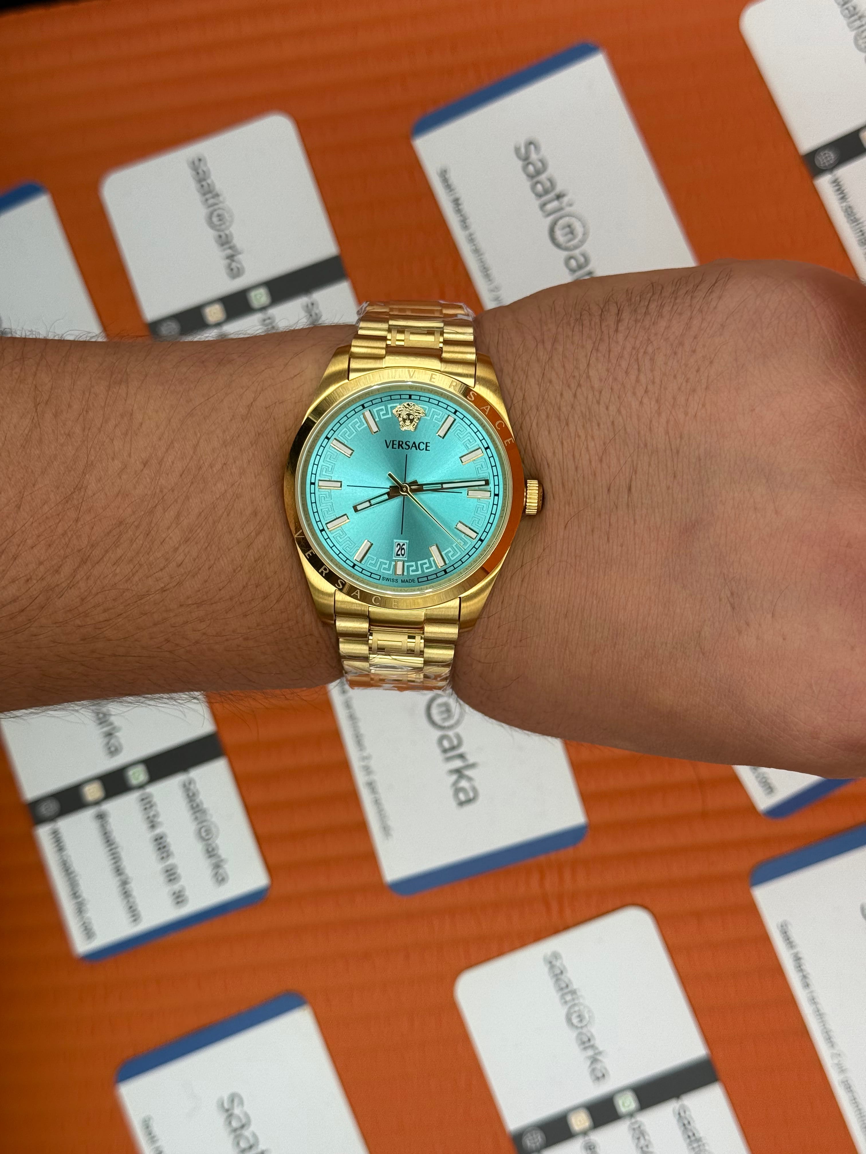 VERSACE 40mm turkuaz kadran gold kasa kordon erkek kol saati