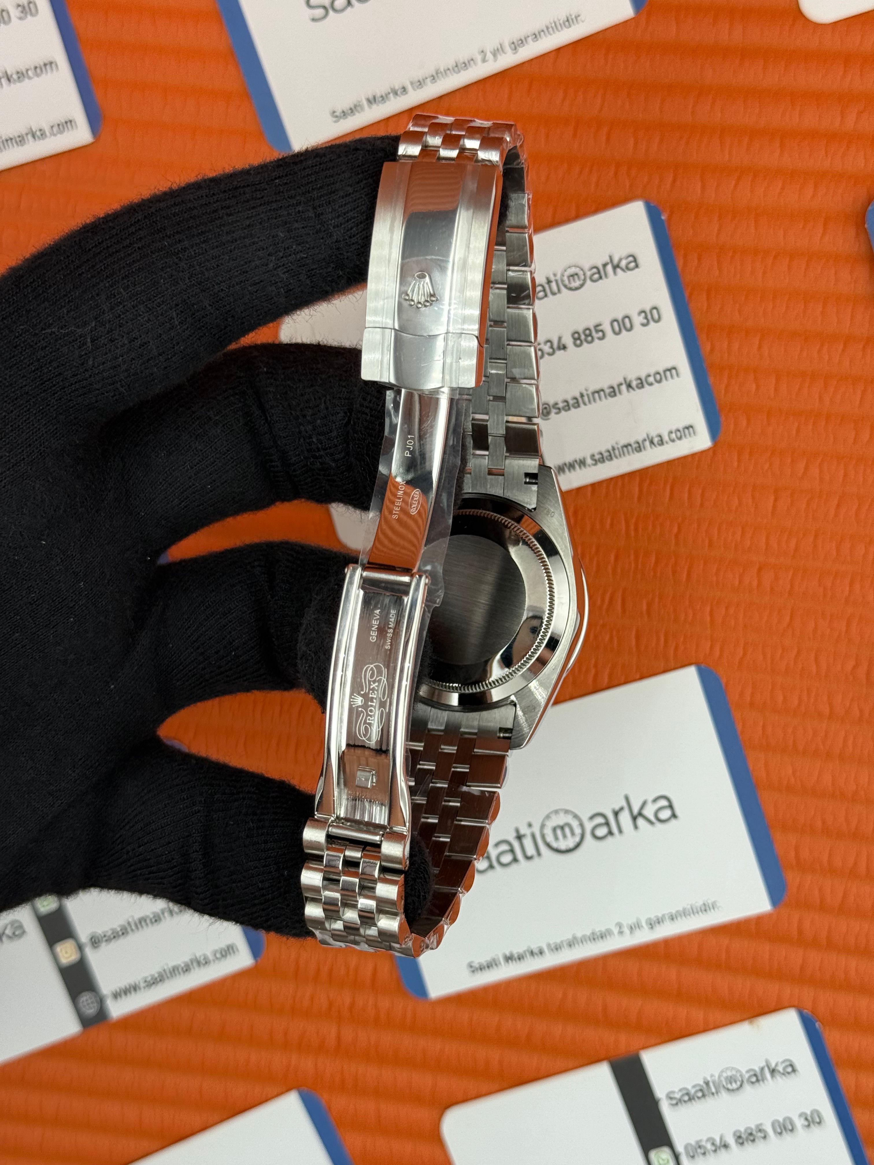 ROLEX Day Date taşlı bezel roma rakamlı yeşil kadran silver jubilee kordon