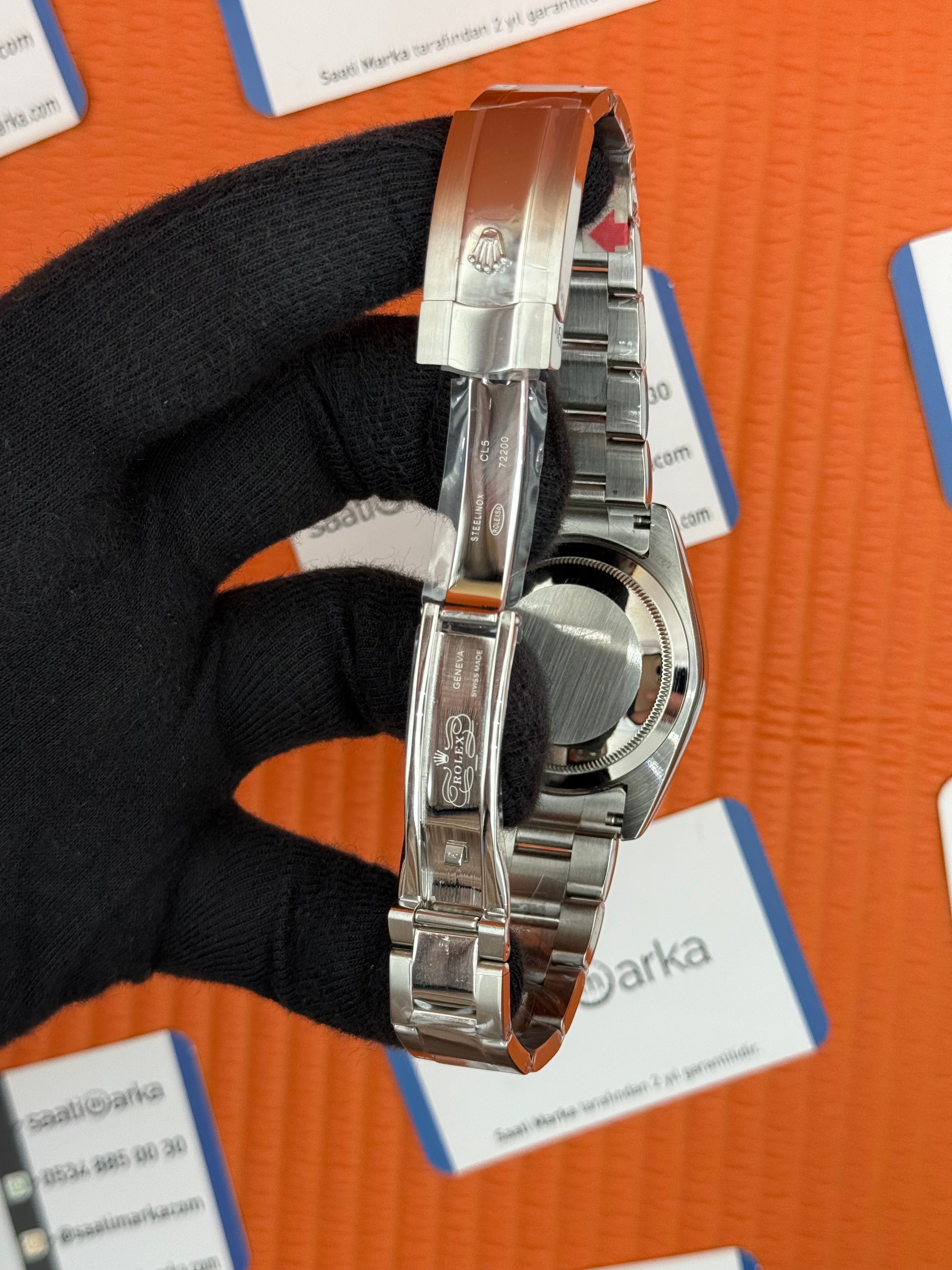 ROLEX Datejust green dial silver oyster kordon