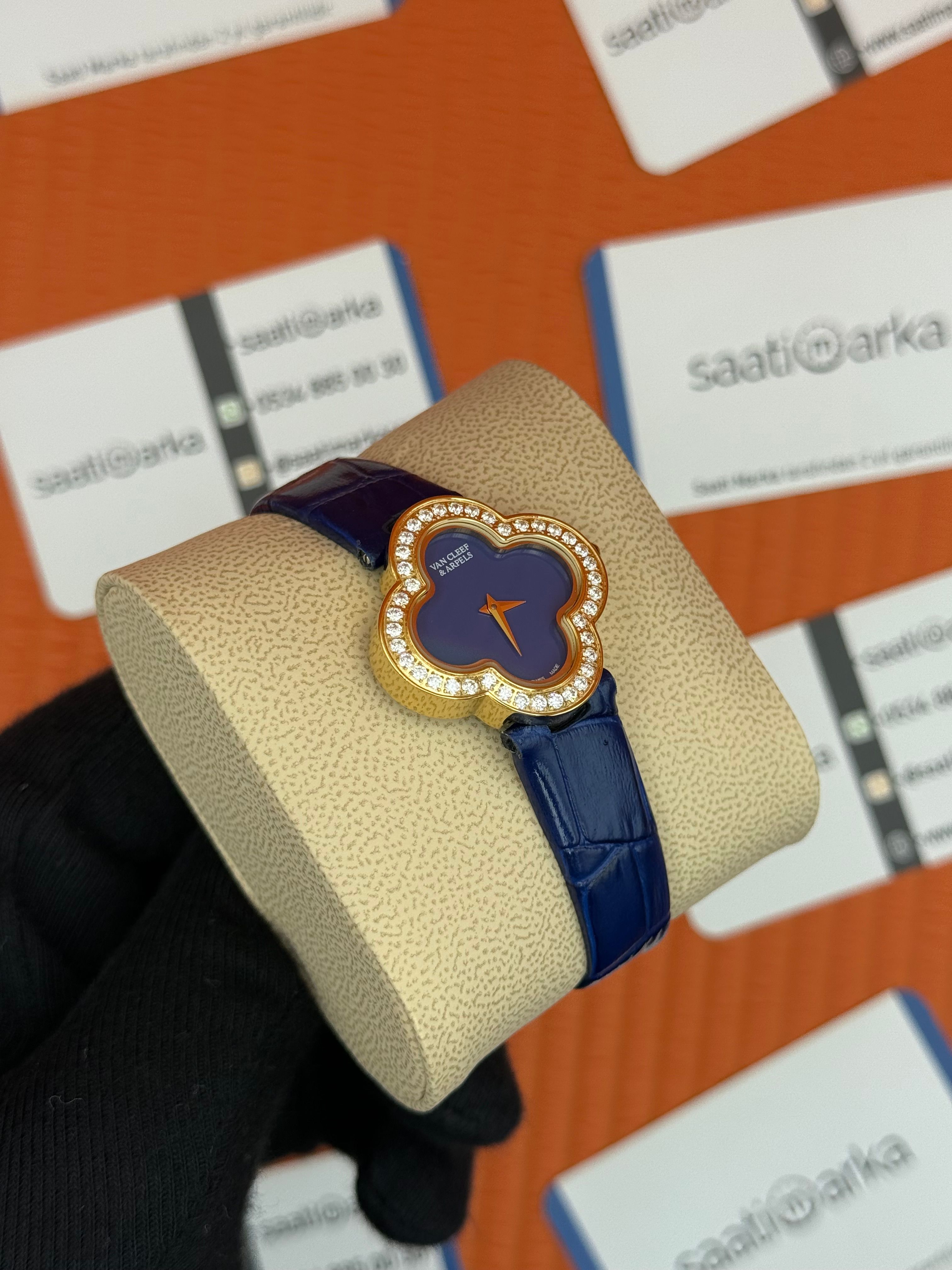 VAN CLEEF lacivert kadran lacivert deri kordon gold kasa taşlı bezel kadın kol saati